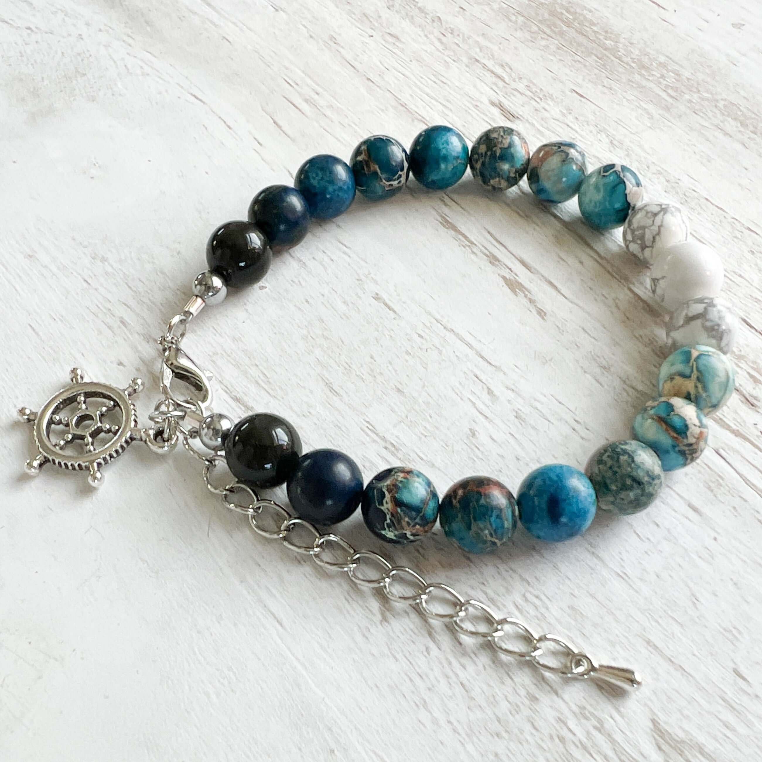 Water Element Bracelet This bracelet is made with black obsidian, dyed sea sediment jasper, and howlite. Together these stones dispel negative energy and open the wearer to emotional healing.