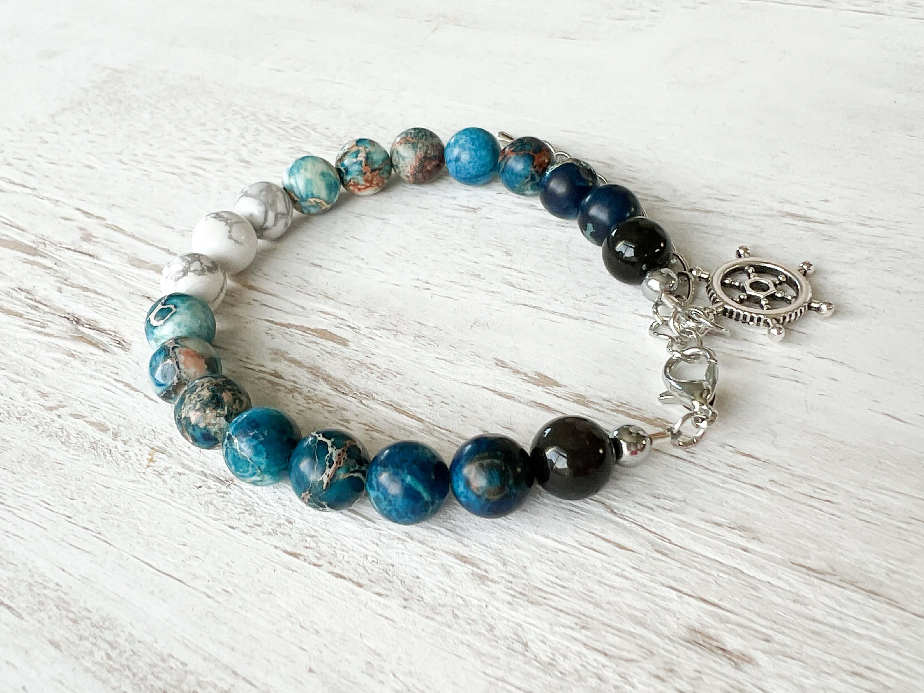Water Element Bracelet This bracelet is made with black obsidian, dyed sea sediment jasper, and howlite. Together these stones dispel negative energy and open the wearer to emotional healing.
