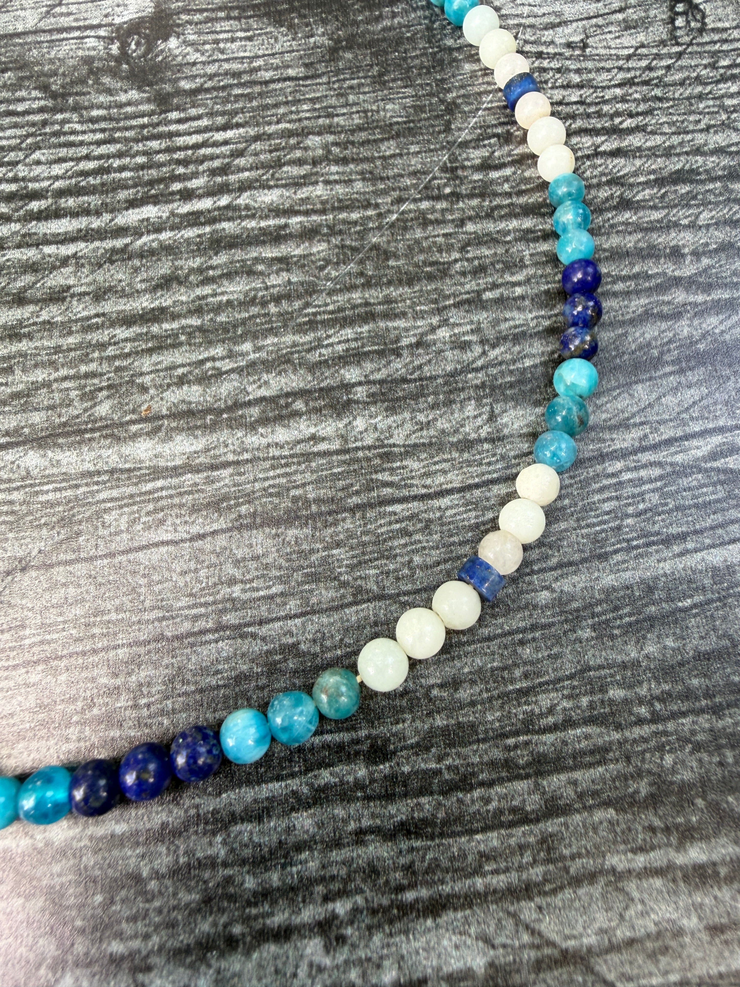 Close up of 4mm beaded necklace made with Apatite, Lapis Lazuli, and Amazonite