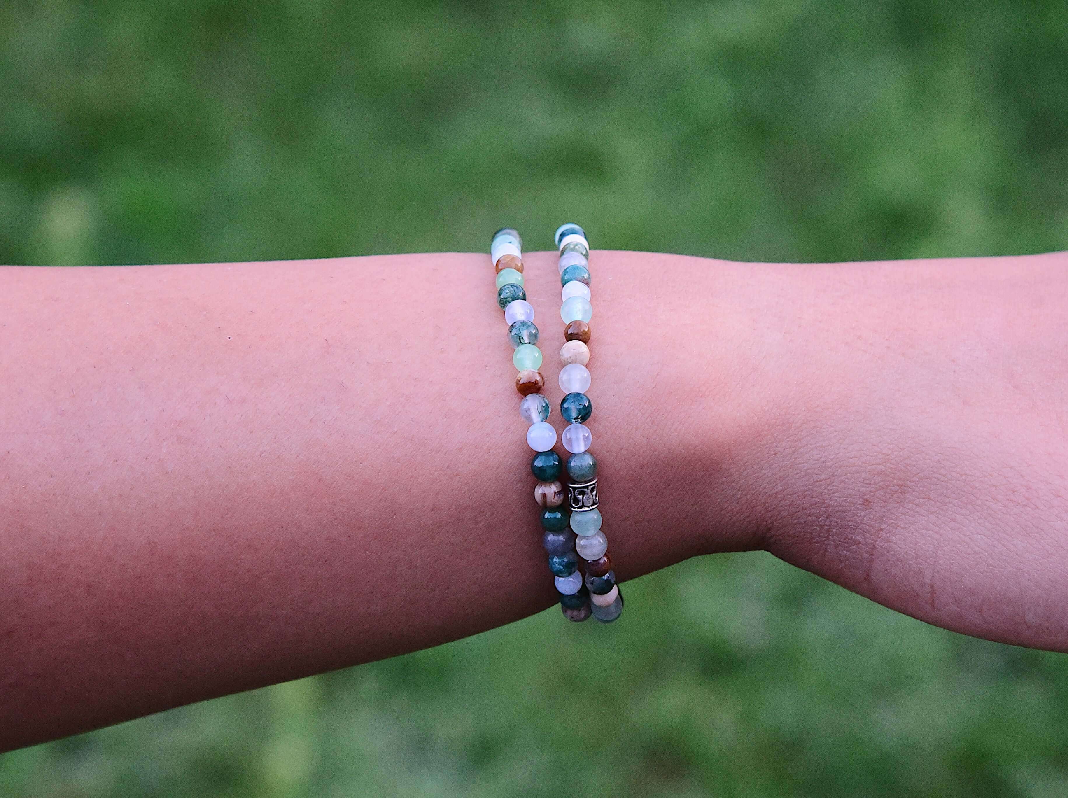 Dappled Sunlight Bracelet This bracelet is made with high-quality Moss Agate, Green Aventurine, Aquamarine, Cloud Quartz & Wood Opal stones which bring abundance and calm to the wearer. Zodiac: Virgo, Taurus, Pisces, Aries, Aquarius & Leo Chakras: Heart,