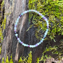 Load image into Gallery viewer, Fluorite and Amethyst Bead Bracelet This bracelet is made with high-quality Fluorite and Amethyst stones which bring stability, protection and awareness to the wearer. Zodiac Sign: Capricorn. Chakra: Heart. Handmade with authentic crystals and gemstones i
