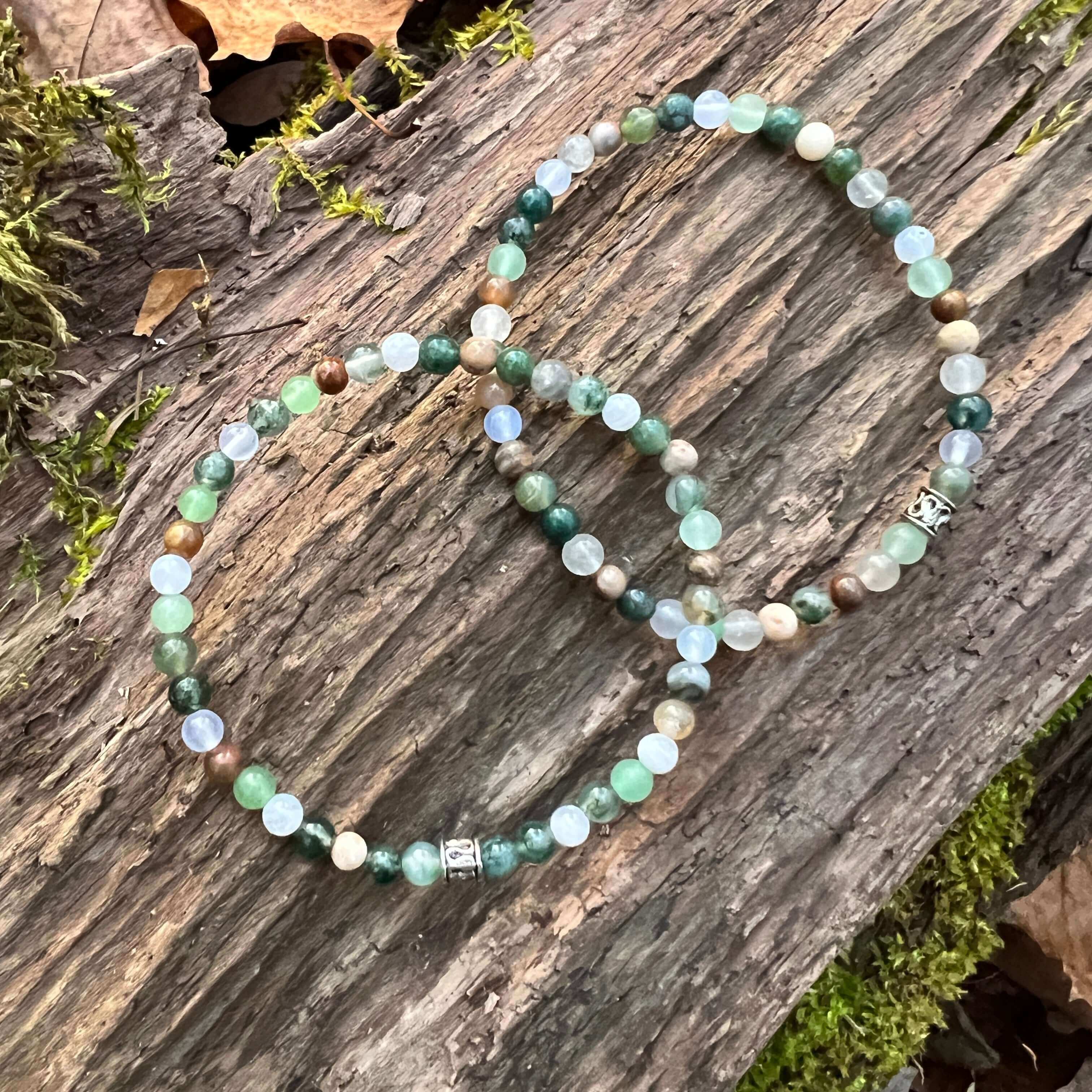 Dappled Sunlight Bracelet This bracelet is made with high-quality Moss Agate, Green Aventurine, Aquamarine, Cloud Quartz & Wood Opal stones which bring abundance and calm to the wearer. Zodiac: Virgo, Taurus, Pisces, Aries, Aquarius & Leo Chakras: Heart,
