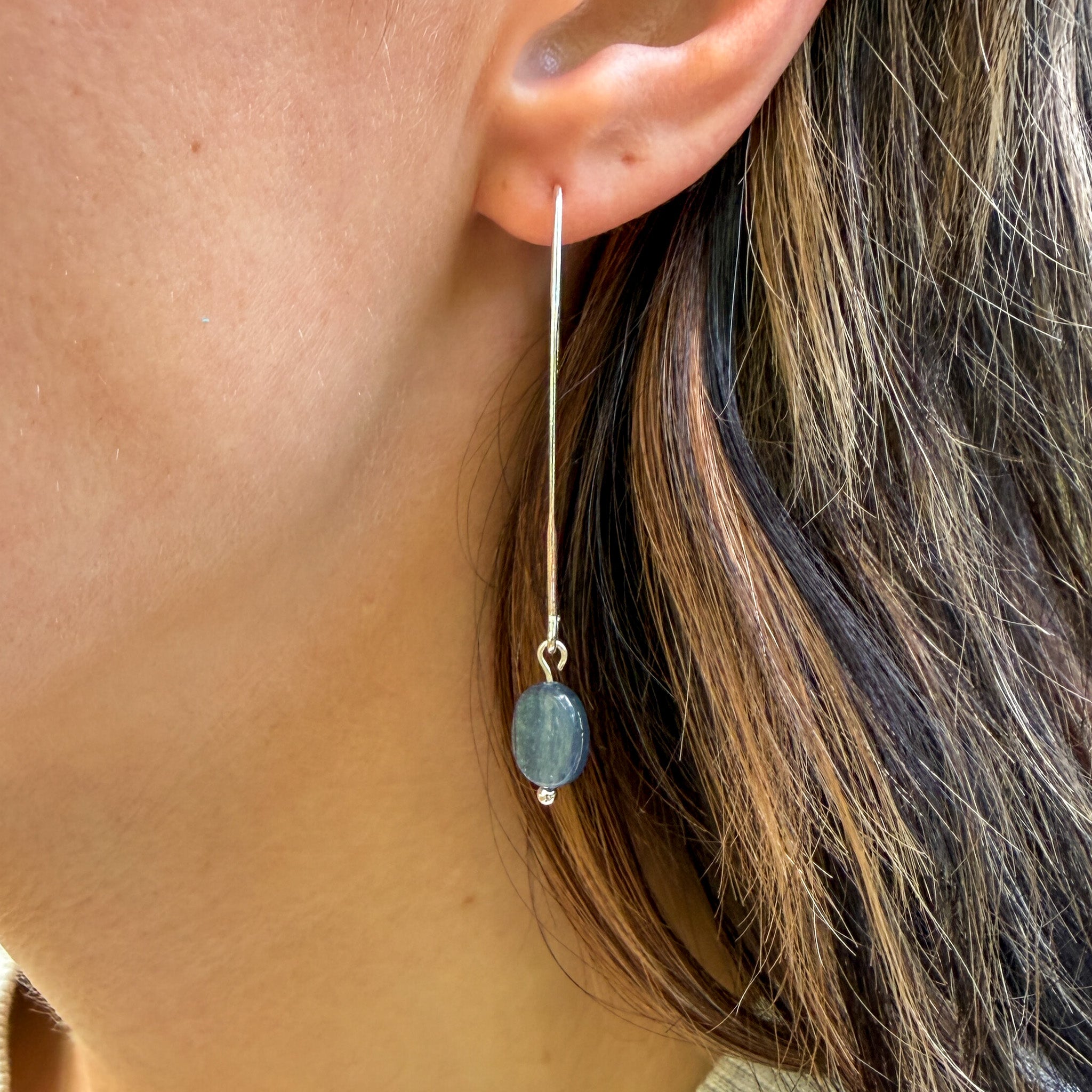 Grade AAA Kyanite earring with stainless steel elongated ear wires on model