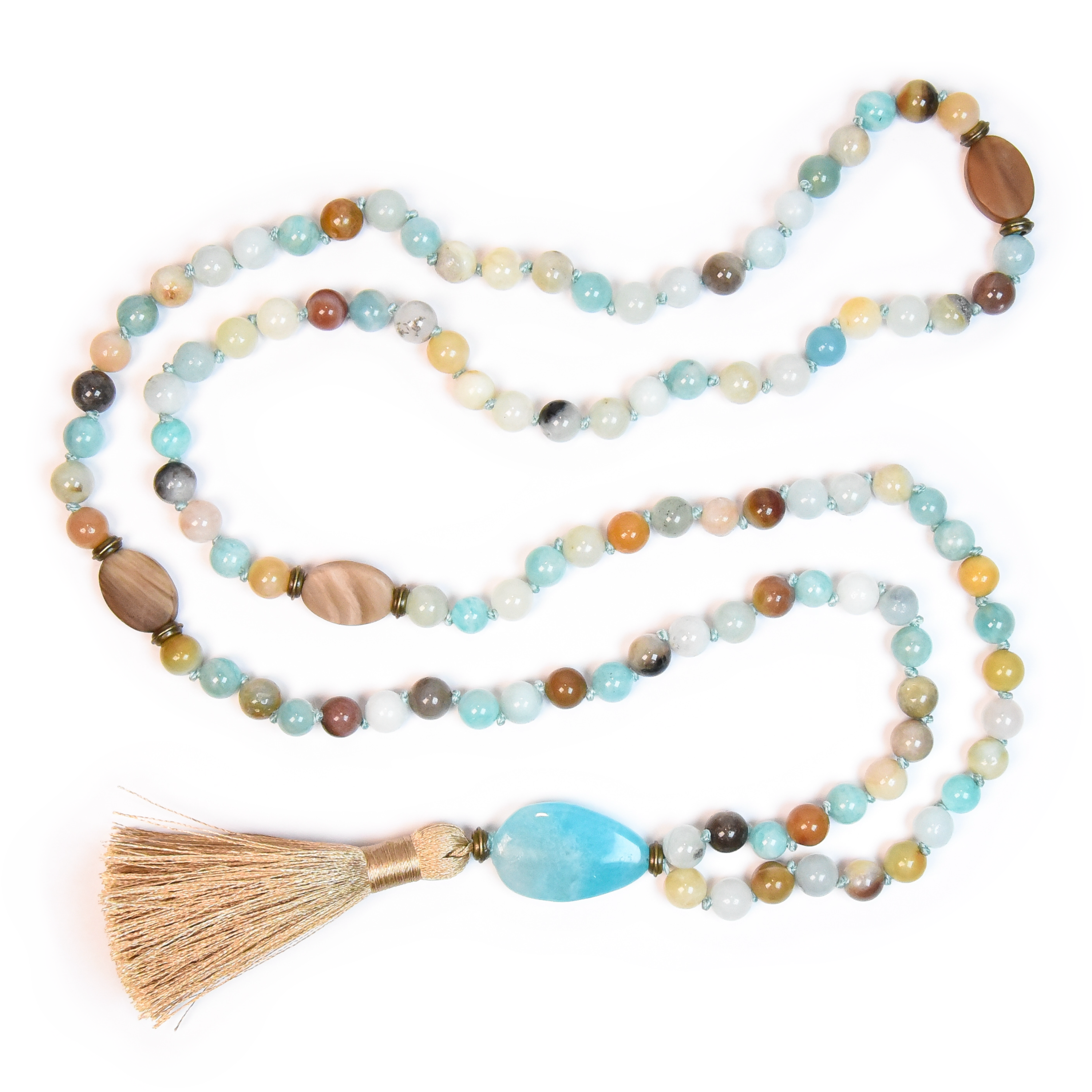 A mala necklace with a variety of matte Wood Opal and polished Amazonite beads, finished with a silky tassel.