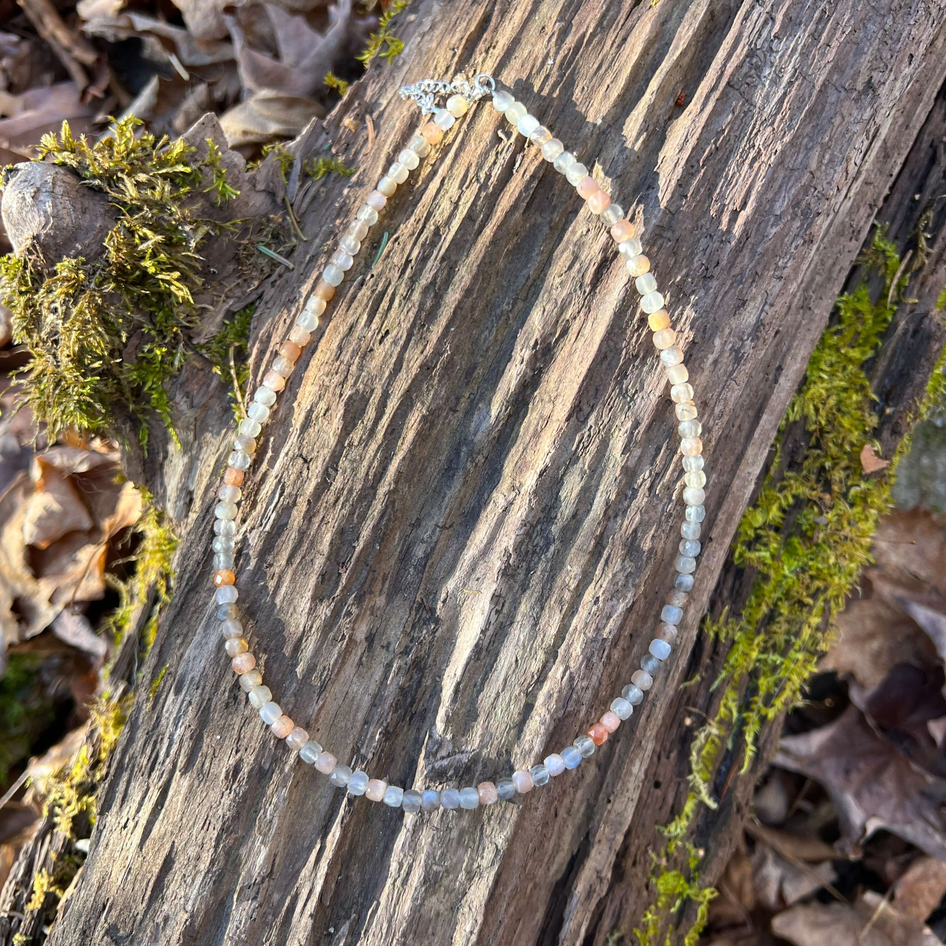 Moonstone Cube Necklace This necklace is made with high-quality Moonstone beads which bring inner growth to the wearer. A stone for “new beginnings”, Moonstone is a stone of inner growth and strength. It soothes emotional instability and stress, and stabi