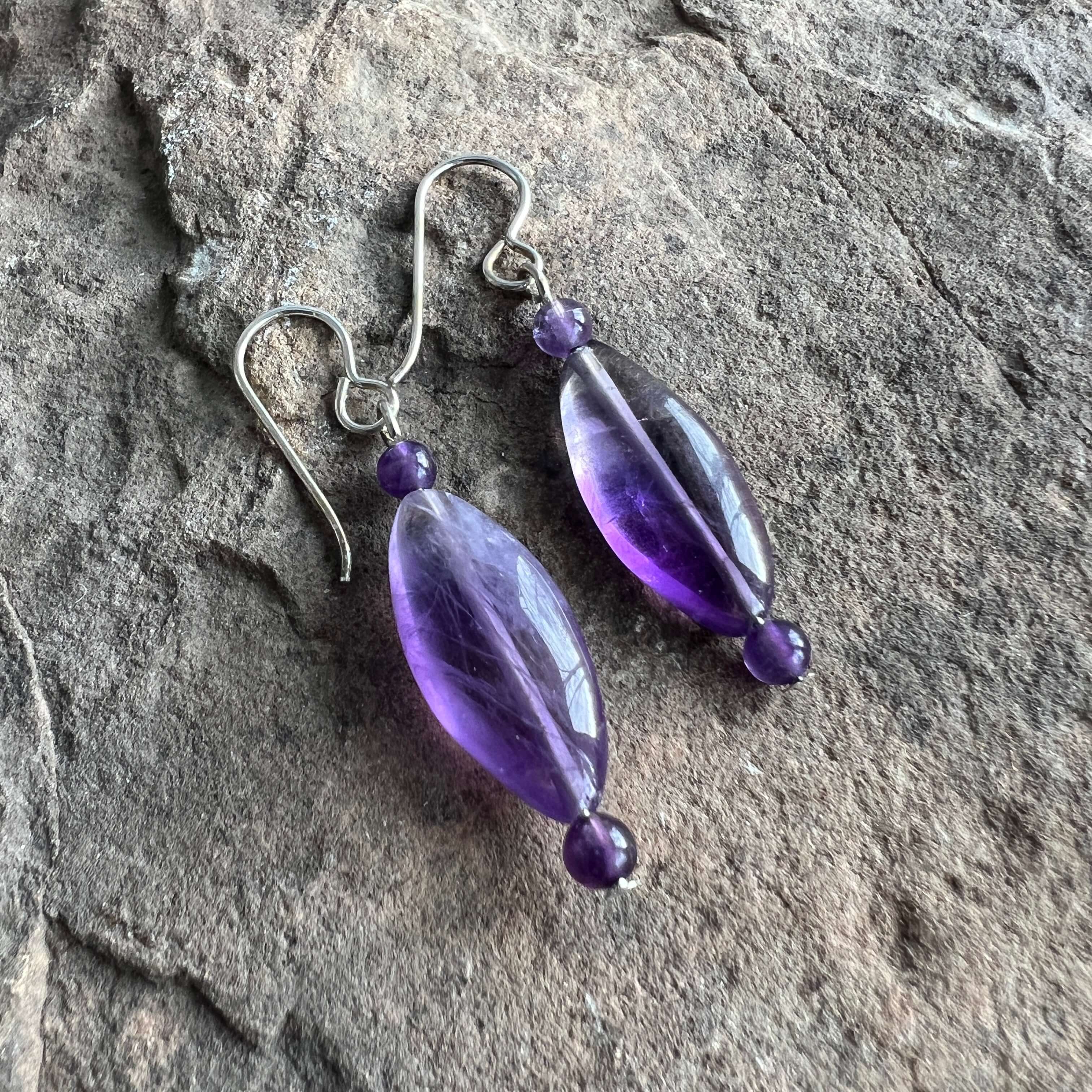 Amethyst Eye Earrings This bracelet is made with high-quality Amethyst stones which bring serenity to the wearer. Amethyst is a stone of serenity. It has been greatly sought after throughout history and was at times valued as highly as Diamond. Today, thi