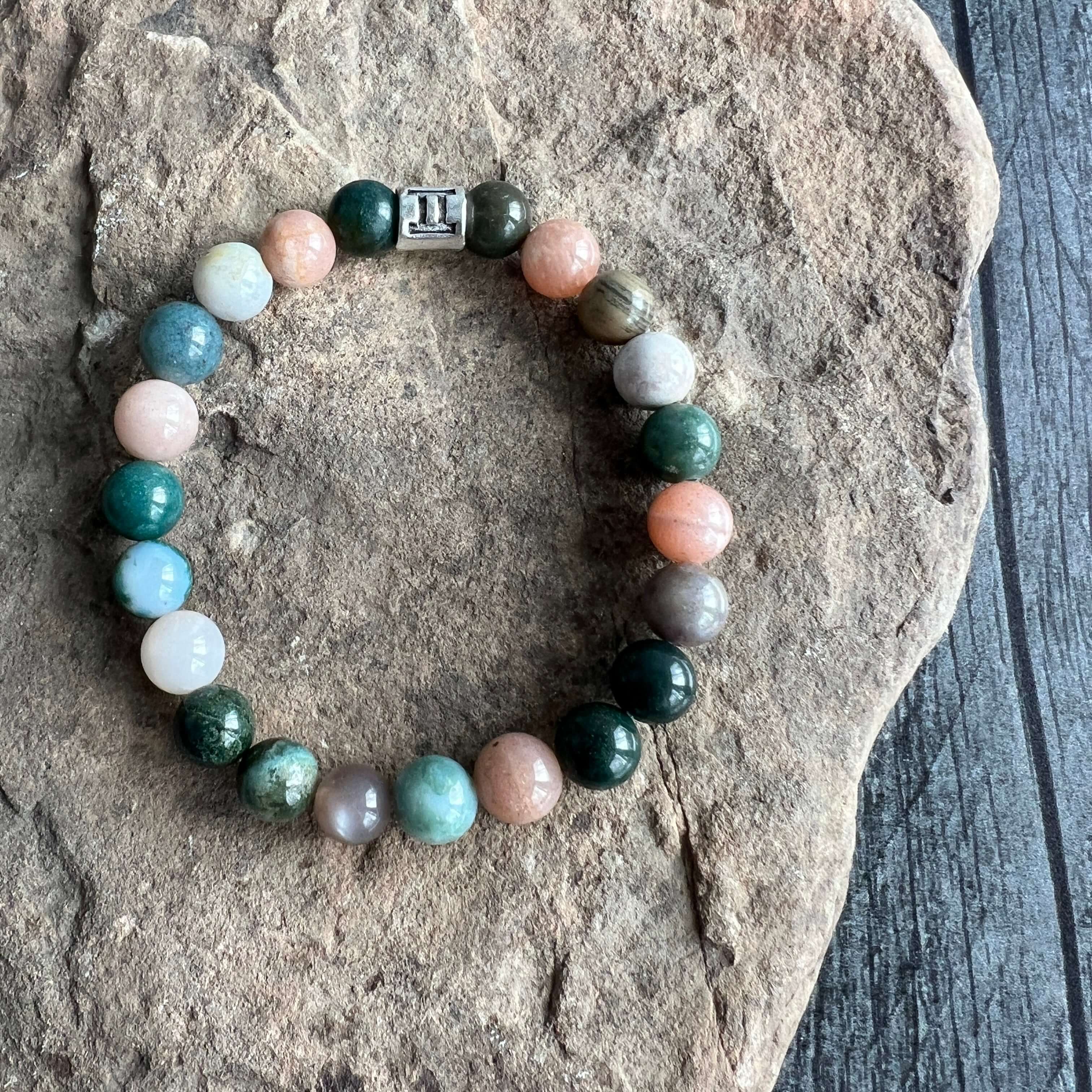 Gemini Zodiac Bracelet The Gemini Zodiac Bracelet is created with a combination of Agate and Moonstone beads with the versatile and expressive qualities associated with this zodiac sign.