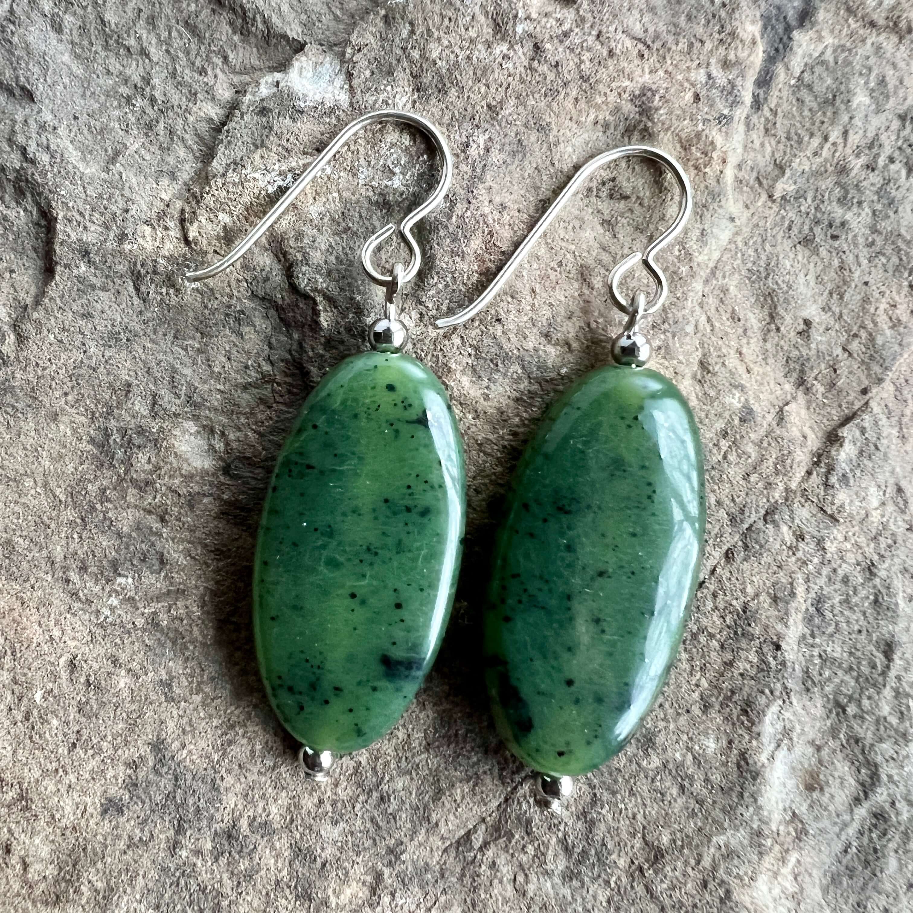 Jade earrings - oval shaped on sterling silver french ear wire.