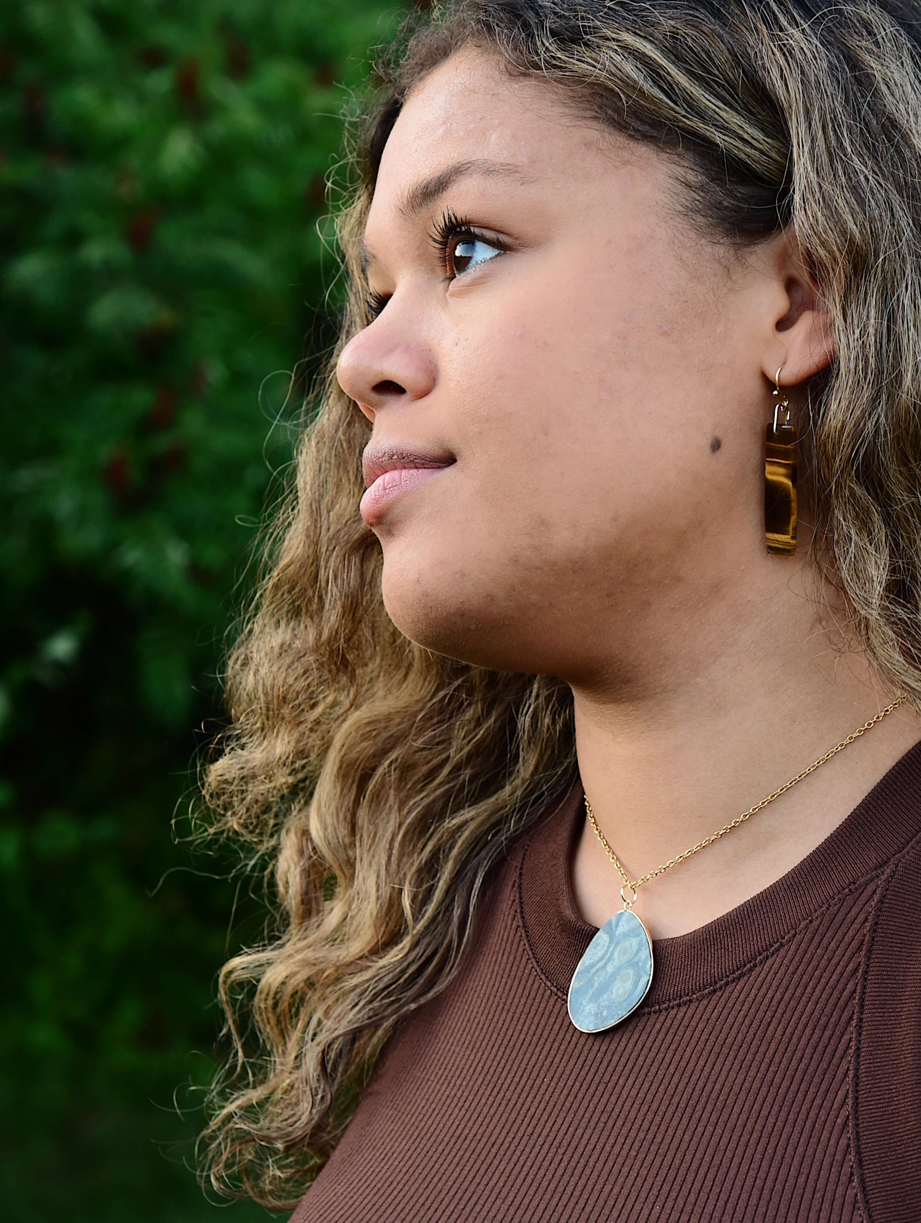 Tiger Eye Earrings These earrings are made with high-quality Tiger Eye stones which bring protection and connection to the wearer. Zodiac Signs: Leo and Capricorn Chakras: Sacral, Solar Plexus, and Third Eye. Handmade with authentic crystals and gemstones