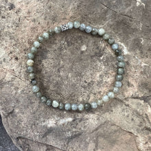 Load image into Gallery viewer, Labradorite Bracelet This bracelet is made with high-quality Labradorite gemstones which provide support and perseverance during times of change. Zodiac Signs: Sagittarius, Scorpio &amp; Leo Chakras: Third Eye &amp; Crown. Handmade with authentic crystals and gem
