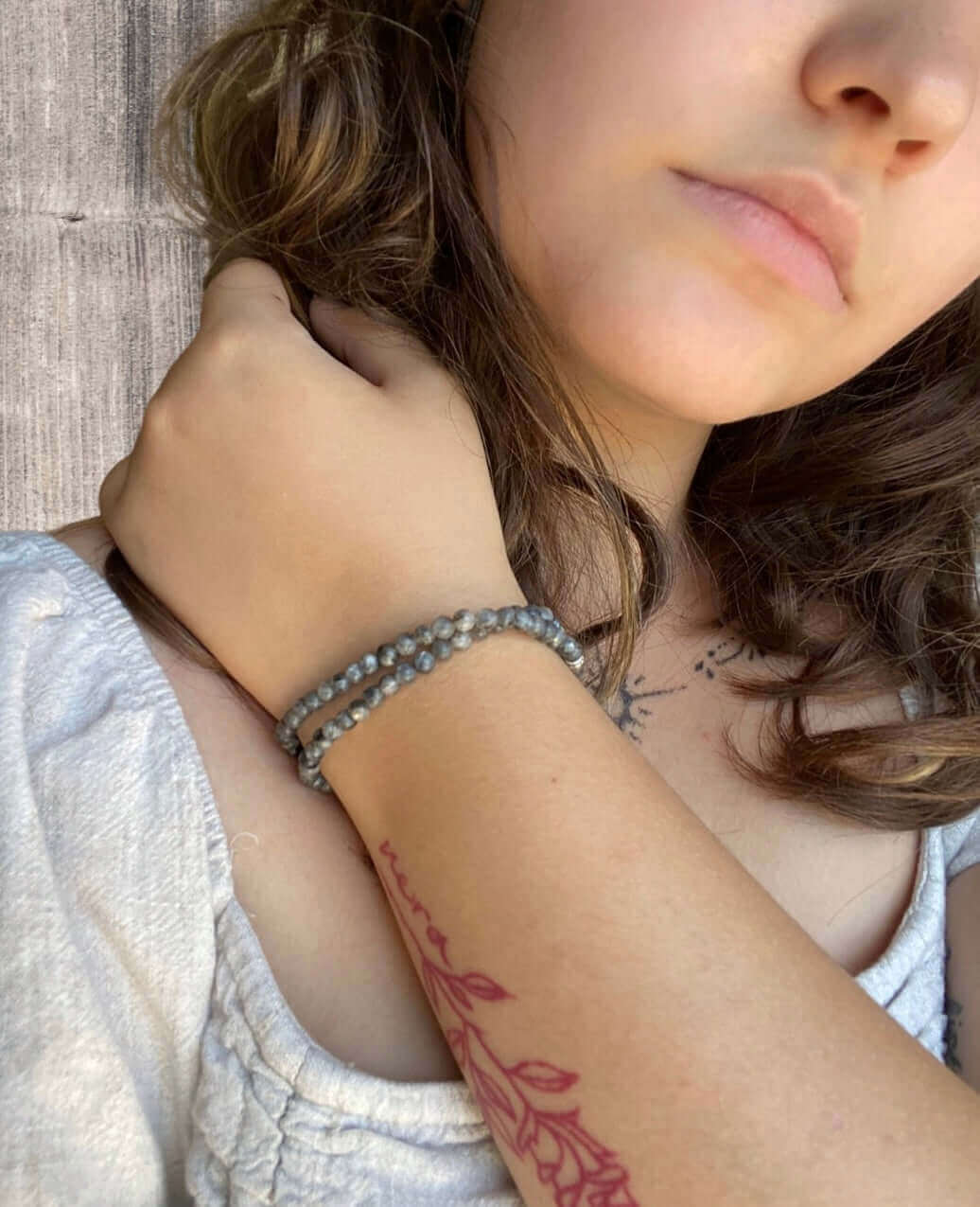 Larvikite Bracelet This bracelet is made with high-quality Larvikite stones which bring protection and a strong connection to nature to the wearer. Zodiac Signs: Aquarius. Chakras: Root and Third Eye. Handmade with authentic crystals & gemstones in Minnea