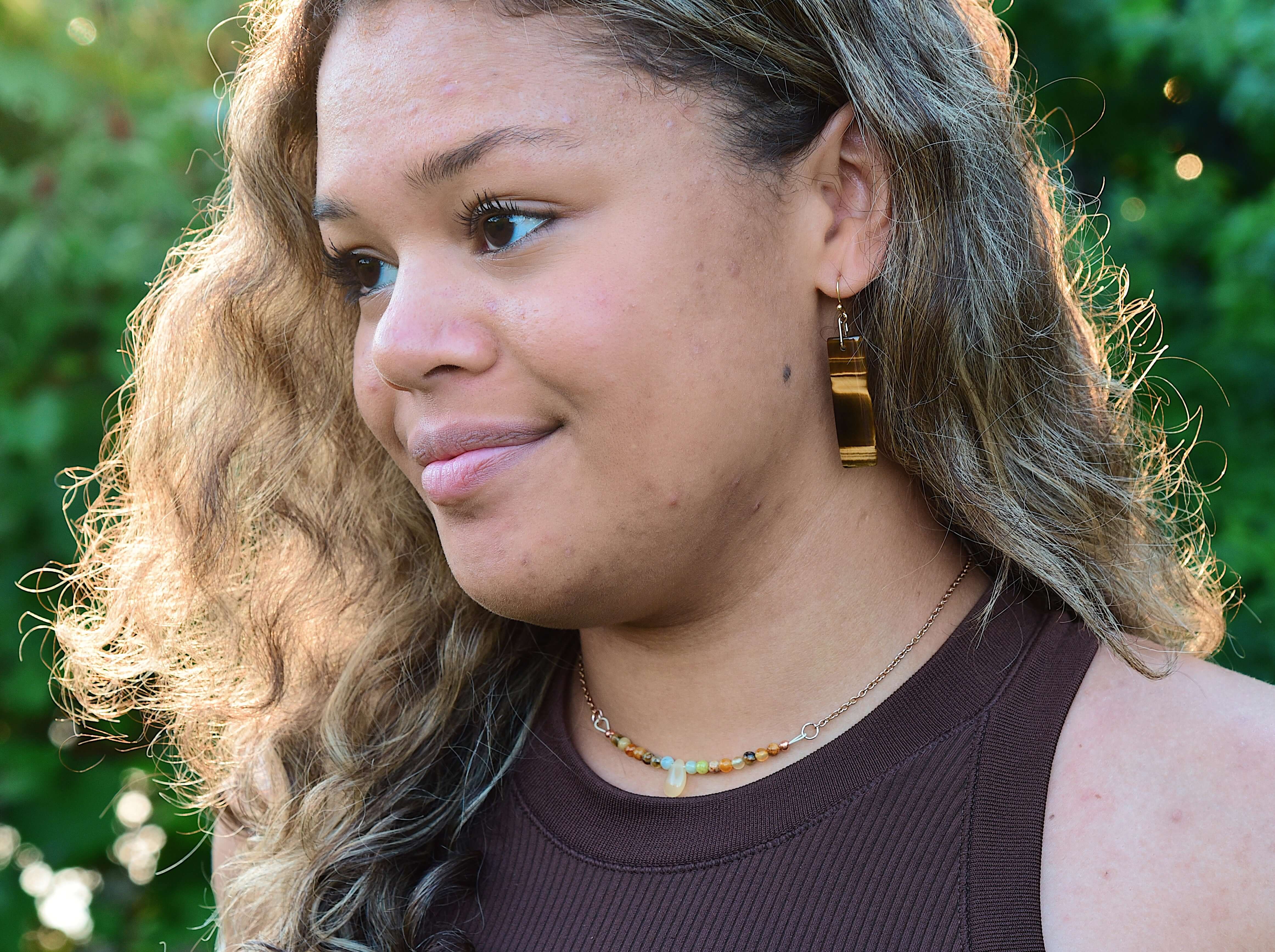 Tiger Eye Earrings These earrings are made with high-quality Tiger Eye stones which bring protection and connection to the wearer. Zodiac Signs: Leo and Capricorn Chakras: Sacral, Solar Plexus, and Third Eye. Handmade with authentic crystals and gemstones