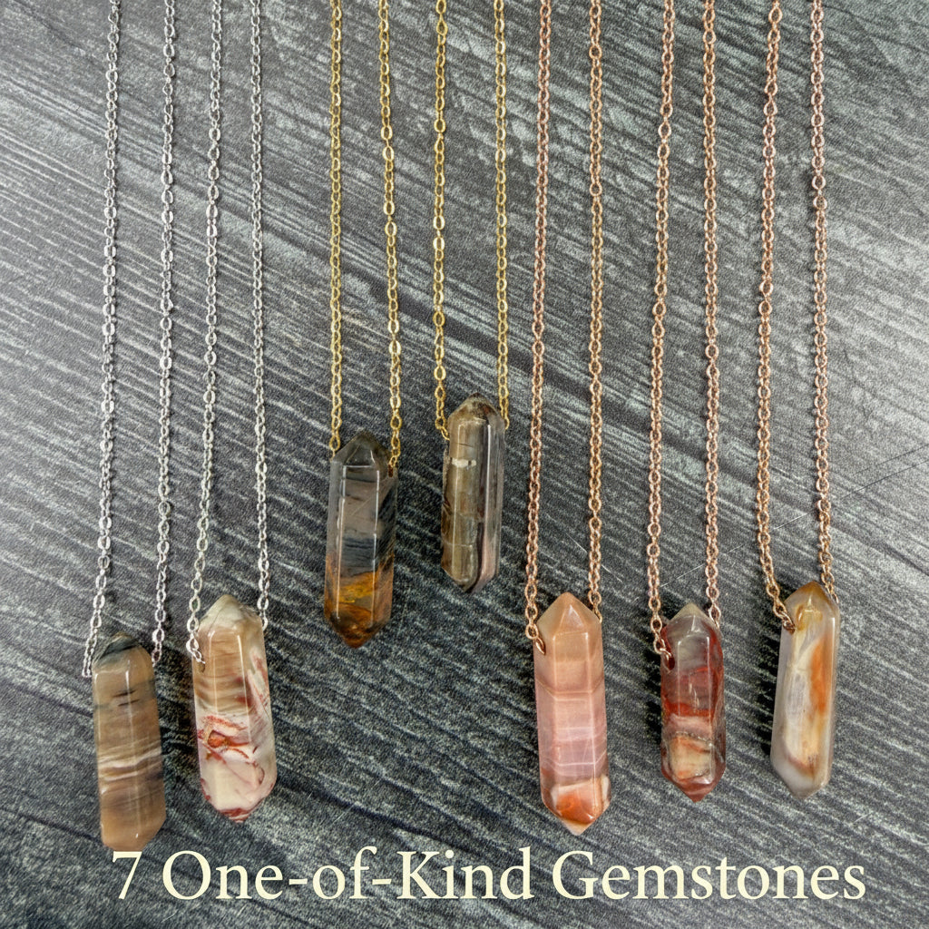 Earth Points Collection featuring seven unique Petrified Wood Agate Point Necklaces with gold, silver, and rose gold stainless steel chains