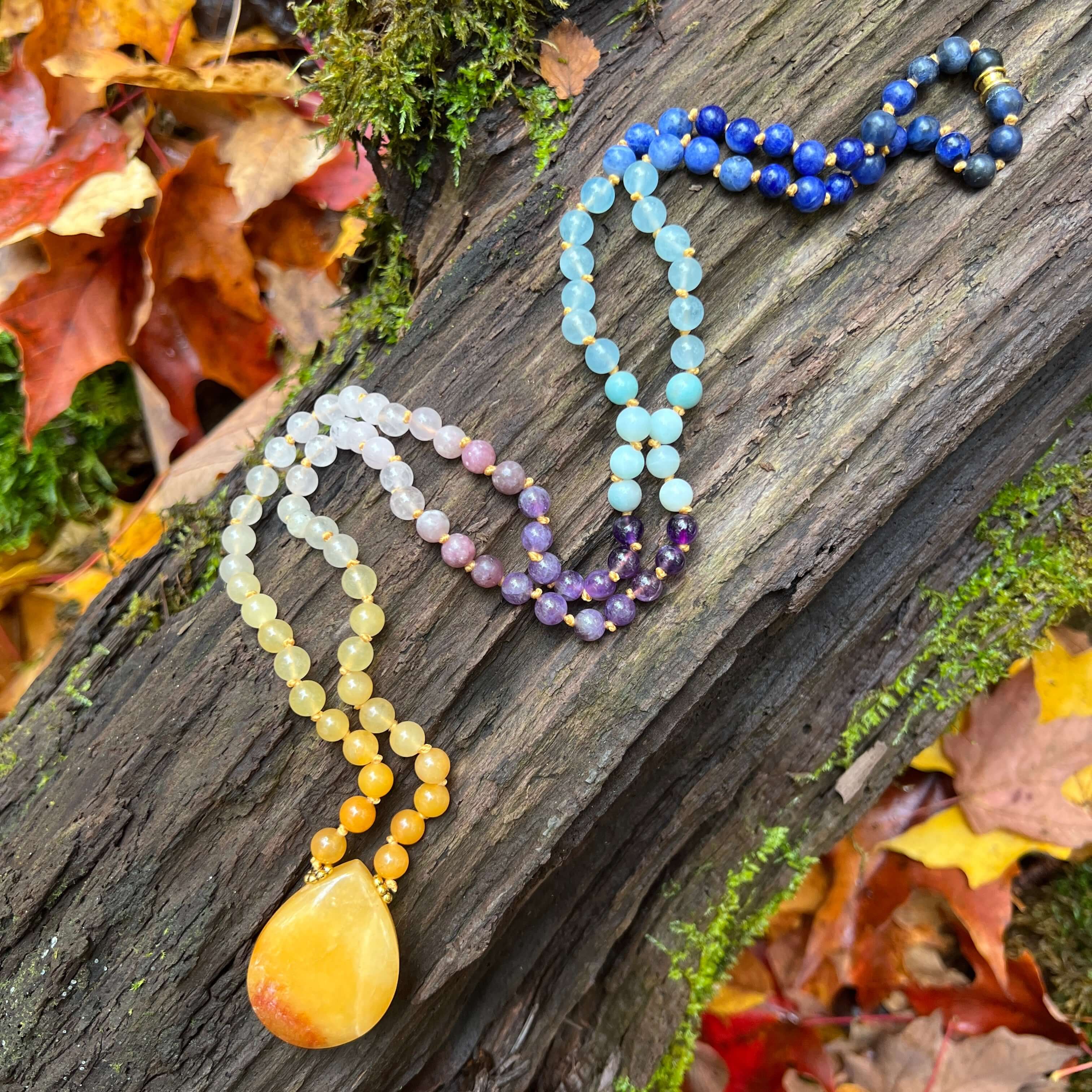 Sunrise Mala This mala is made with Jade, Moonstone, Rose Quartz, Aquamarine, and Lapis Lazuli gemstones which give the wearer a lift in energy. Zodiac Signs: Aries, Pisces, Sagittarius, Libra, Taurus. Chakras: Sacral, Solar Plexus, Throat, Crown, Third E