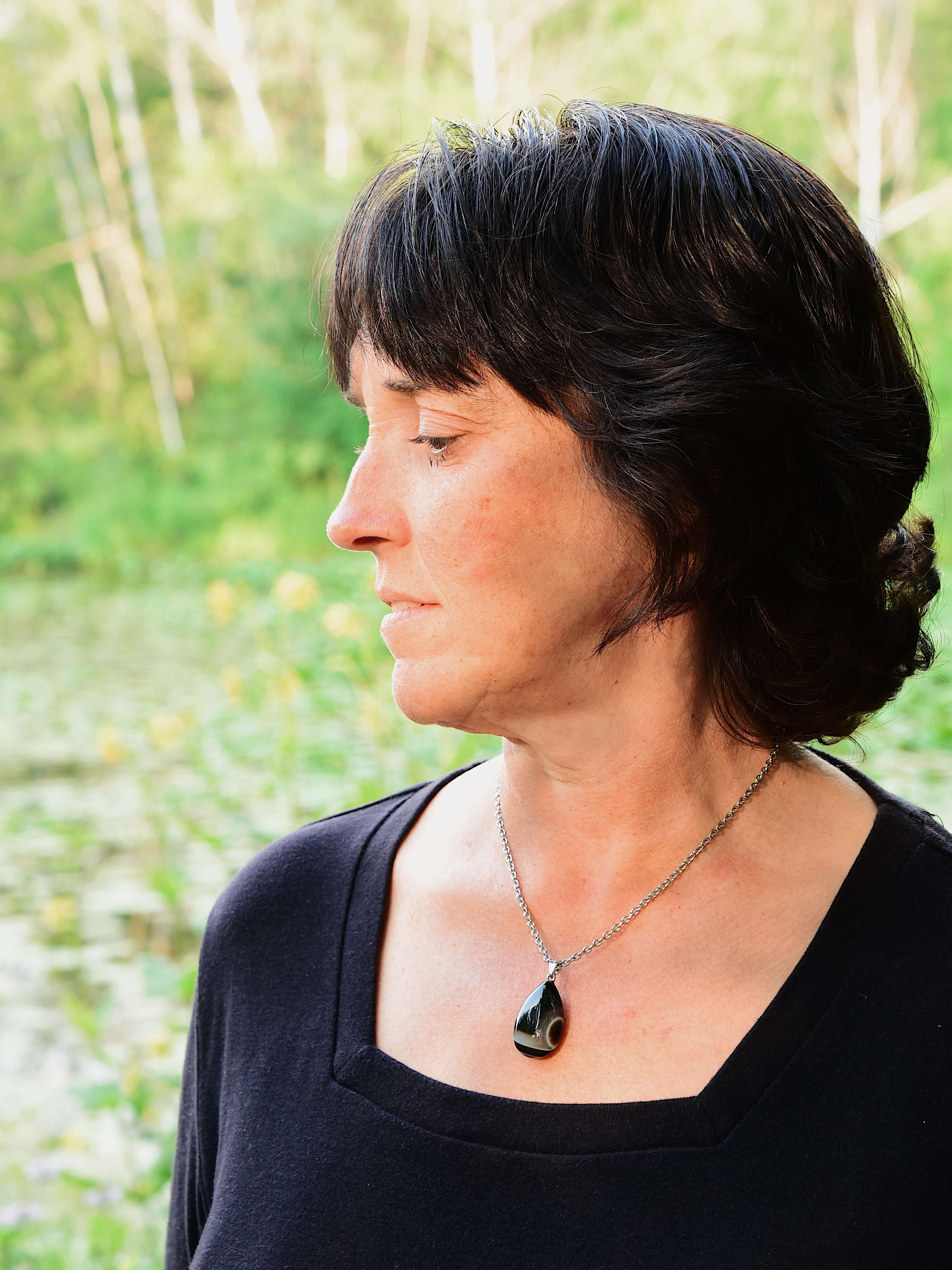 Tuxedo Agate Teardrop Necklace This necklace is made with a high-quality Tuxedo Agate stone which brings stability and release to the wearer. Zodiac: Gemini & Virgo Chakras: Third Eye, Root, Crown & Heart. Handmade with authentic crystals and gemstones.