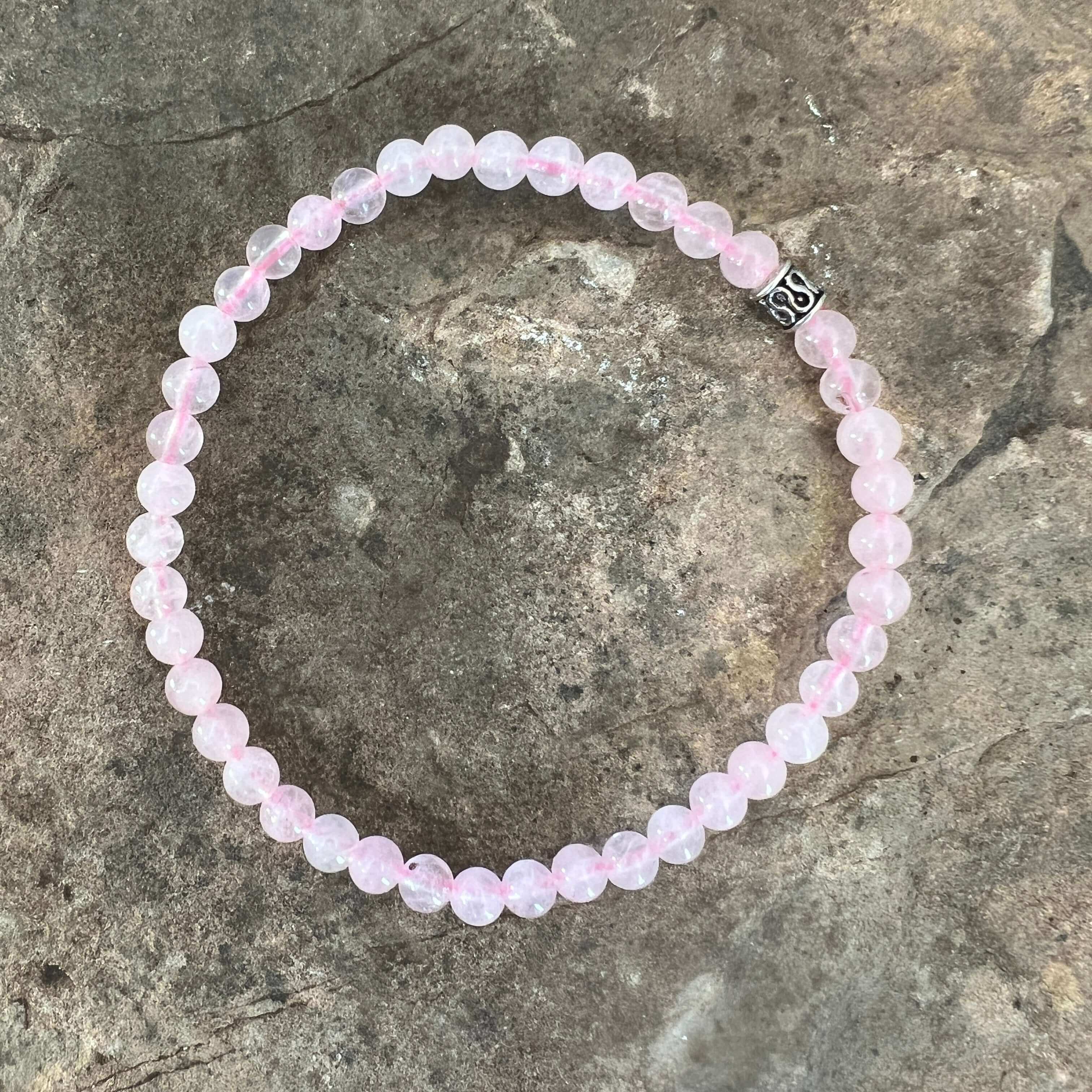 Rose Quartz Bead Bracelet This bracelet is made with high-quality Rose Quartz gemstones which bring love and purification to the wearer. Zodiac Sign: Taurus. Chakra: Heart. Handmade with authentic crystals & gemstones in Minneapolis, MN.