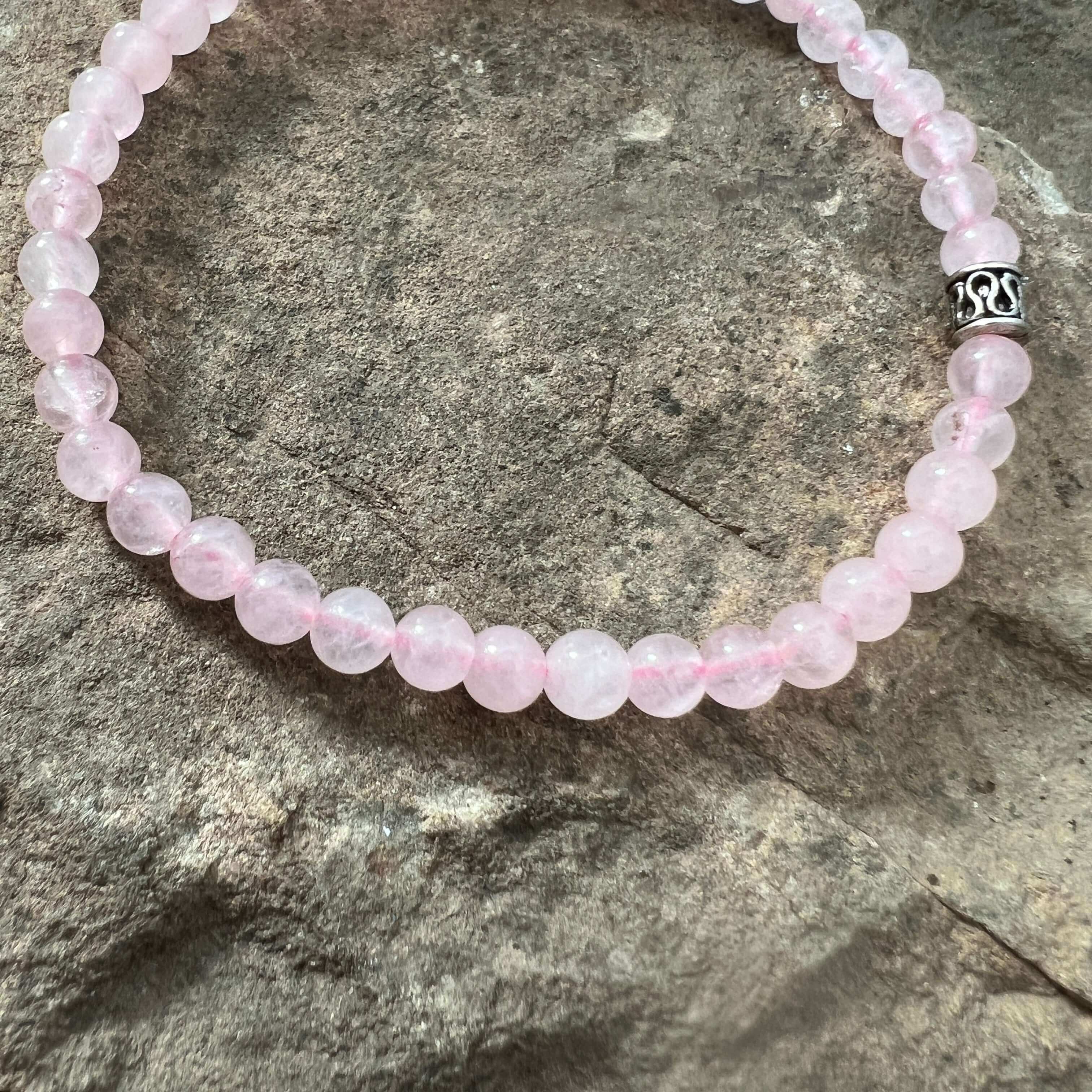 Rose Quartz Bead Bracelet This bracelet is made with high-quality Rose Quartz gemstones which bring love and purification to the wearer. Zodiac Sign: Taurus. Chakra: Heart. Handmade with authentic crystals & gemstones in Minneapolis, MN.