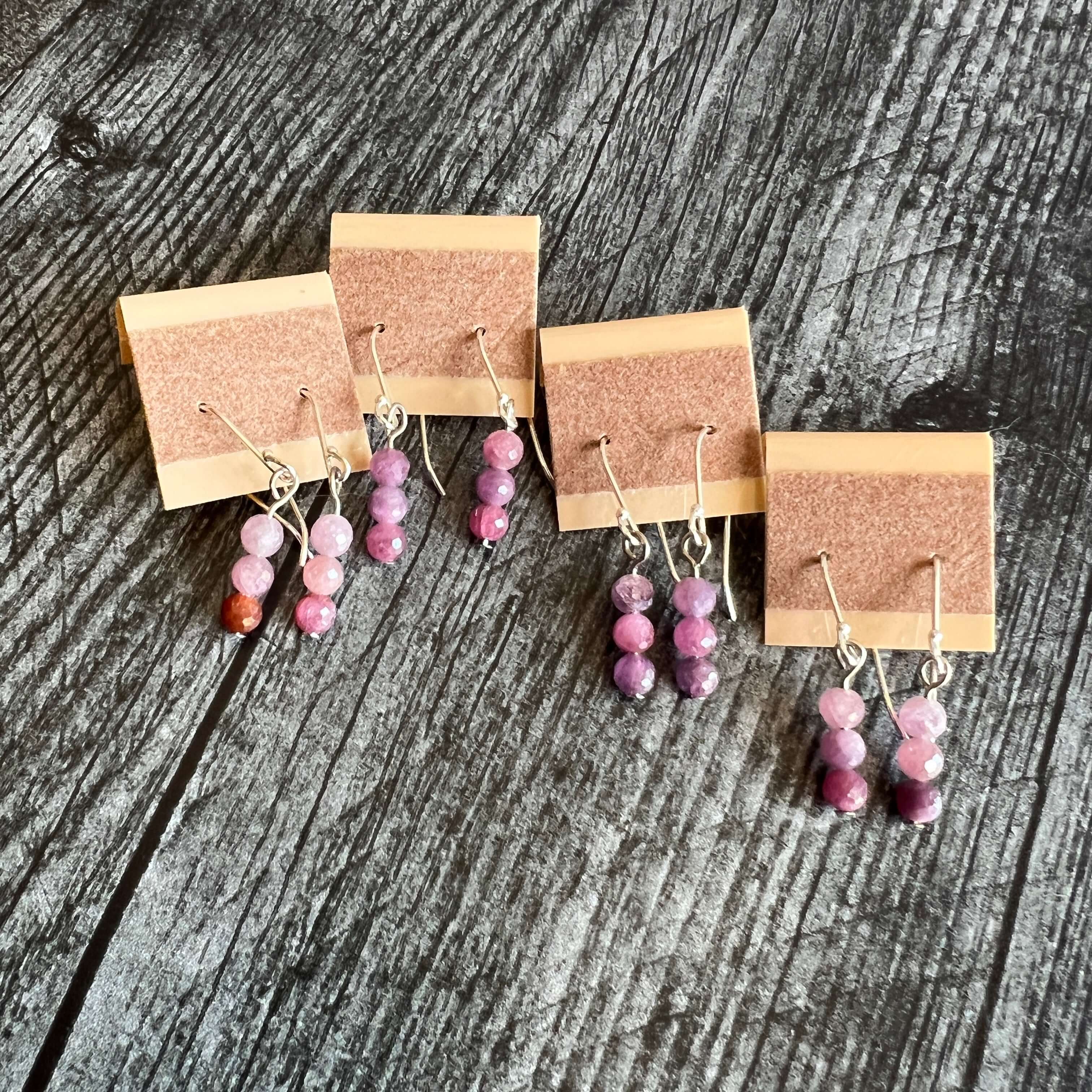 Ruby Earrings These earrings are made with high-quality Ruby gemstones which bring protection and confidence to the wearer. Chakra: Root. Birthstone: July. Anniversary: 40th. Handmade with authentic crystals & gemstones in Minneapolis, MN.