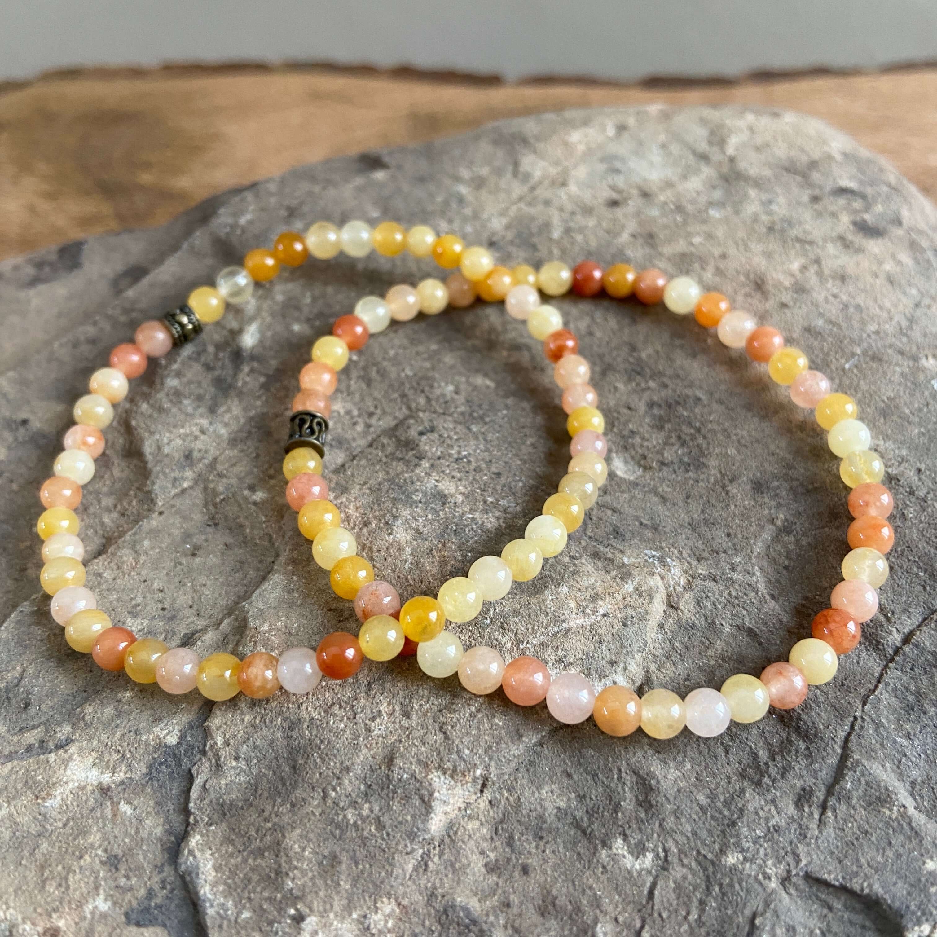 Yellow Jade Mini Bead Bracelet This bracelet is made with high-quality Yellow Jade gemstones which bring creativity and supportive energy to the wearer.. Zodiac: Aries & Pisces. Chakra: Sacral & Solar Plexus. Handmade with authentic crystals & gemstones i