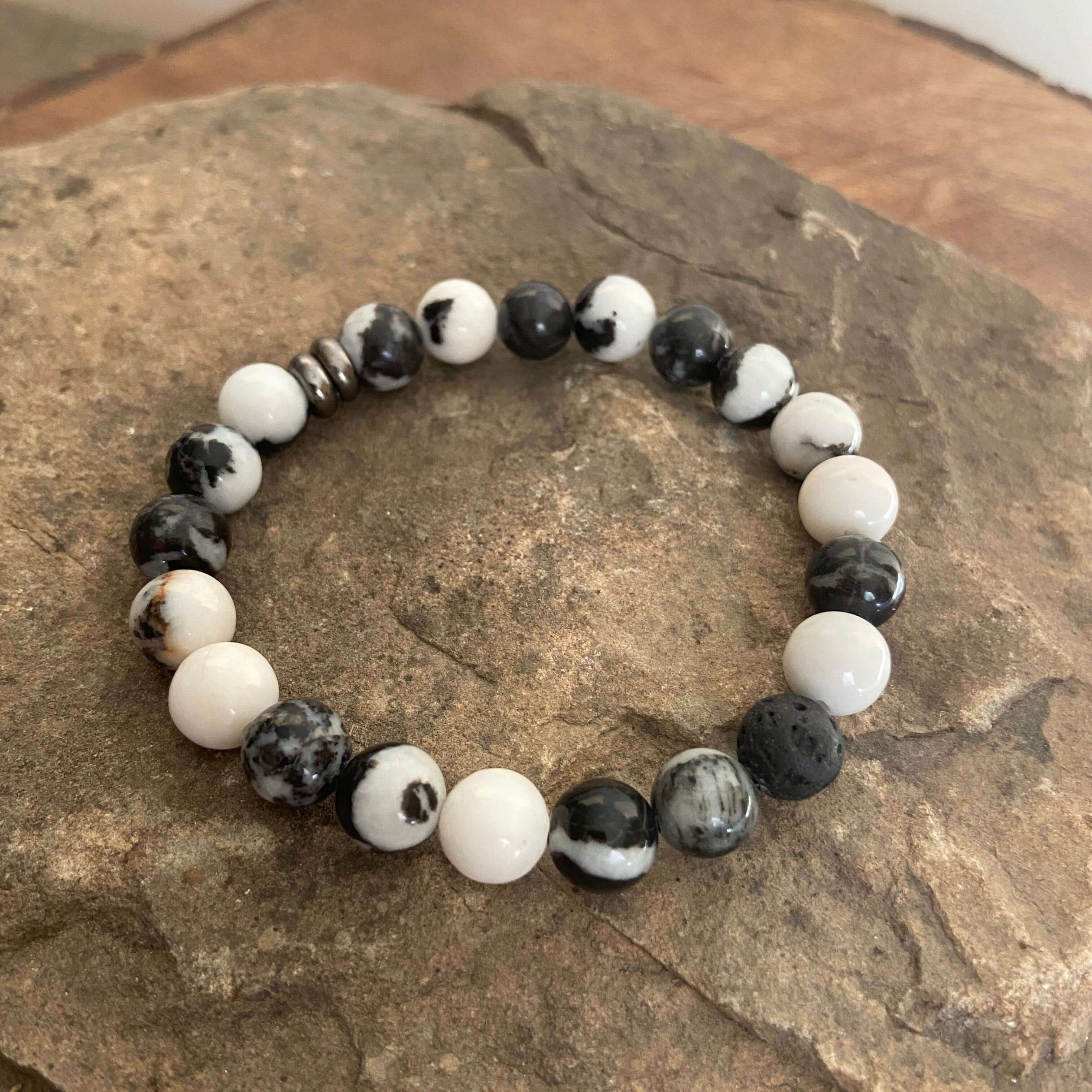 Zebra Jasper Bracelet This bracelet is made with high-quality Zebra Jasper gemstones which bring balance and calm to the wearer. Zodiac Signs: Libra and Virgo. Chakras: Root and Sacral. Handmade with authentic crystals & gemstones in Minneapolis, MN.