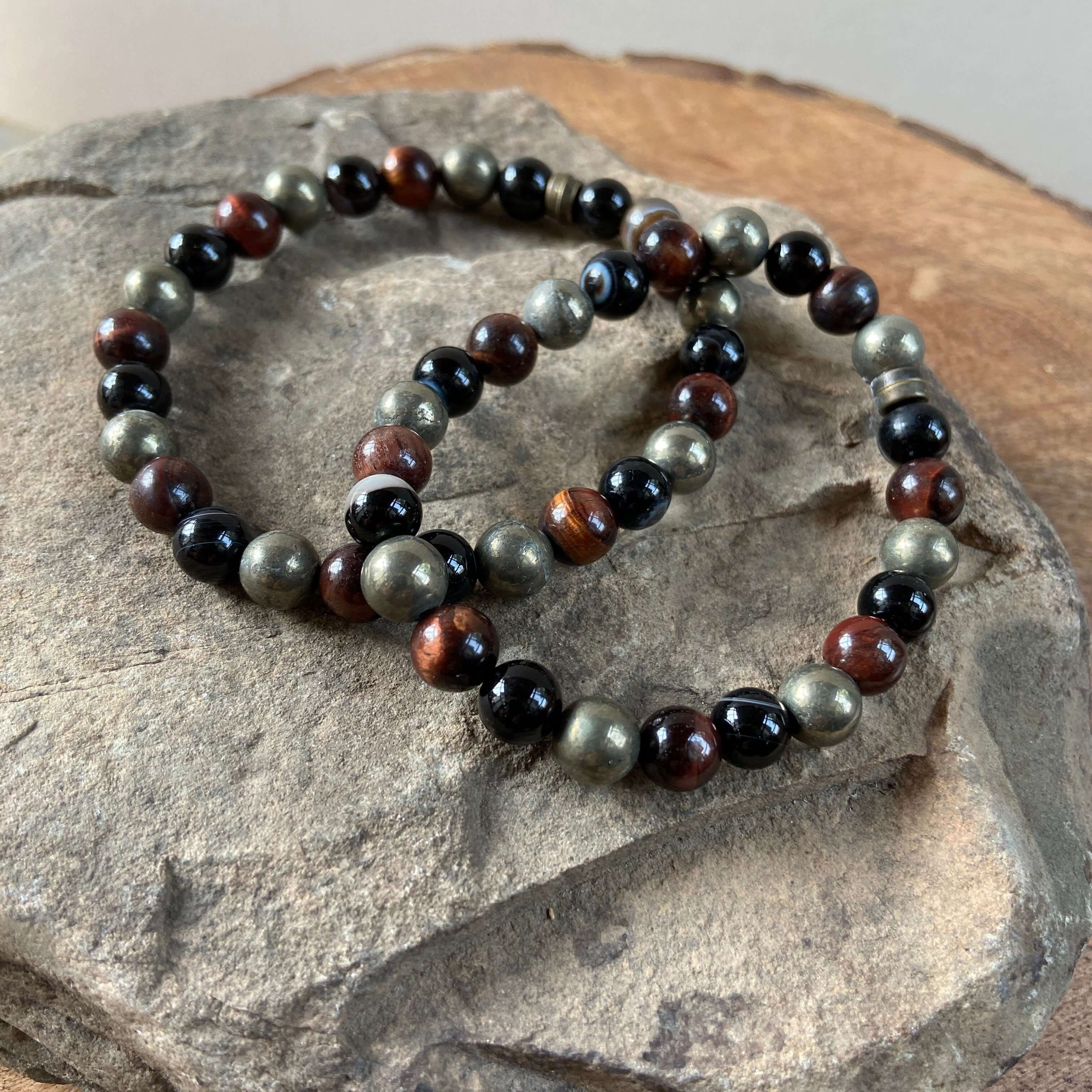 Tiger Eye Mix Bead Bracelet Tiger Eye is grounding. Hematite is a stone of balance. Pyrite is a stone of action. Obsidian is a creative stone. Sardonyx is a stone of strength. Zodiac Signs: Leo, Capricorn, Aquarius, Sagittarius, Scorpio Chakras: Sacral, S