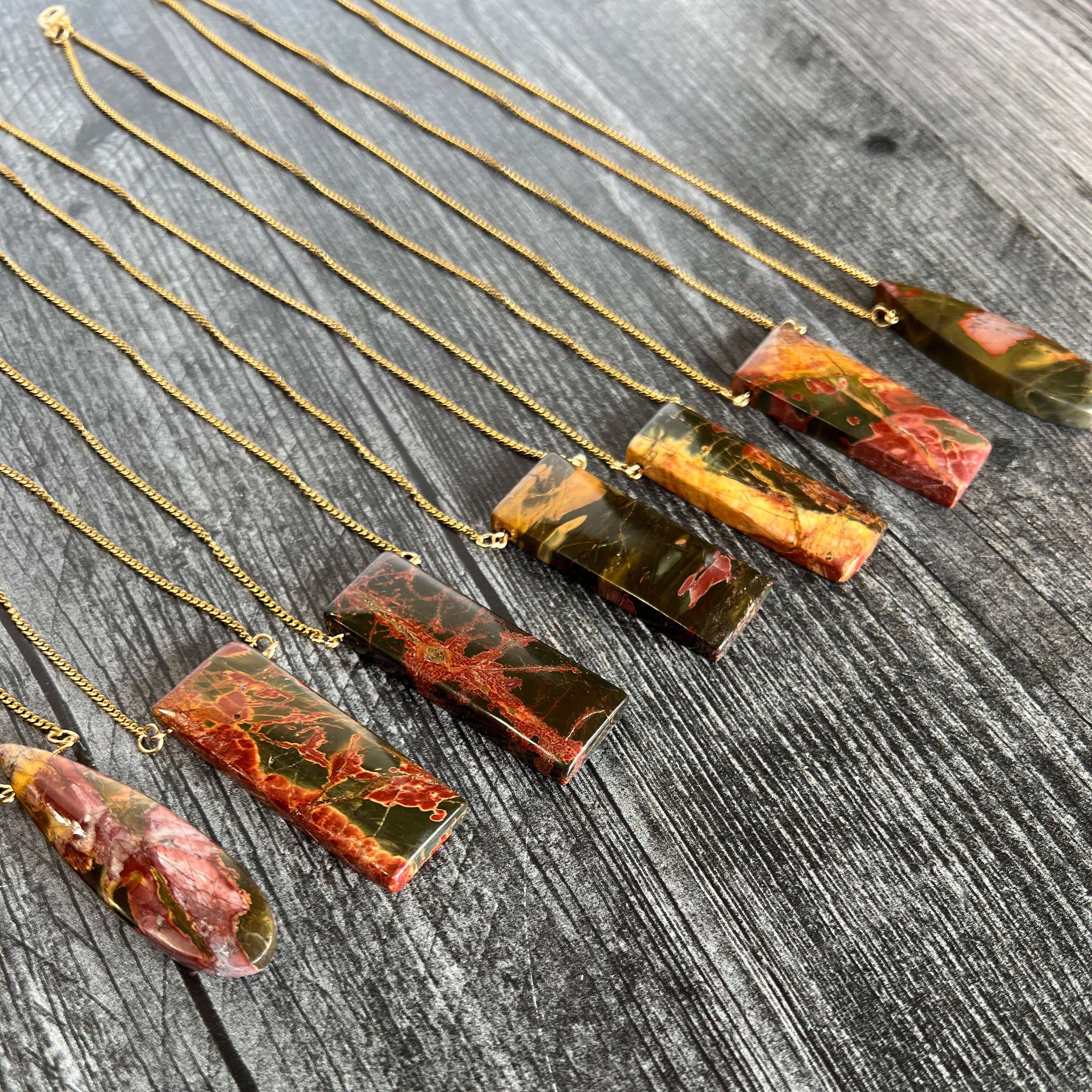 Red Creek Jasper Focal Chain Necklace These necklaces are made with chain and Red Creek Jasper stones which promotes balance and harmony in the wearer. Zodiac Signs: Scorpio & Aries. Chakras: Root & Sacral. Handmade with authentic crystals and gemstones i