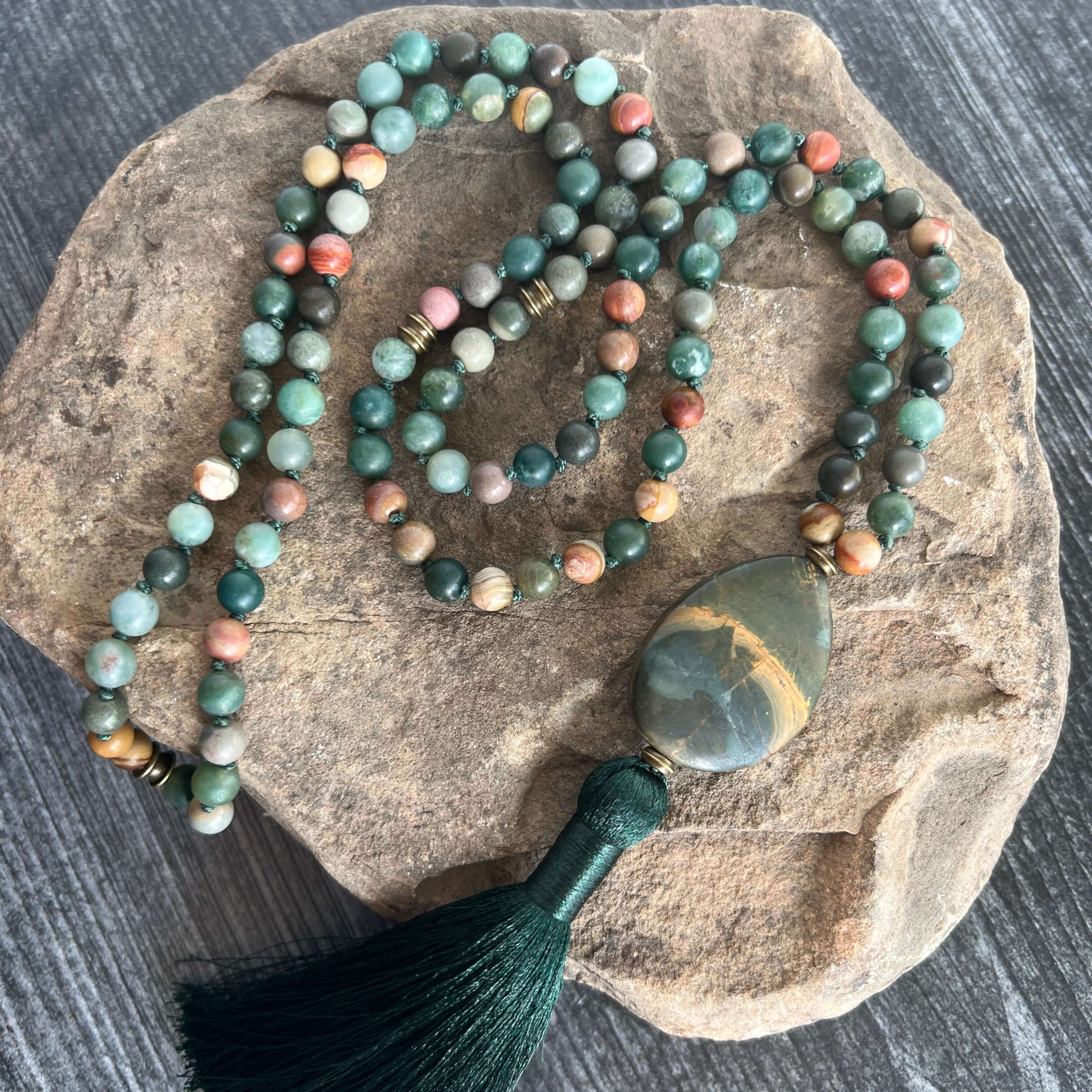 Forest Walk Mala This mala is made with high-quality Agate and Jasper gemstones which bring strength and tranquility to the wearer. Zodiac Signs: Leo, Gemini, Aries, Scorpio, and Virgo. Chakras: Third Eye, Root, Crown, and Heart. Handmade with authentic c