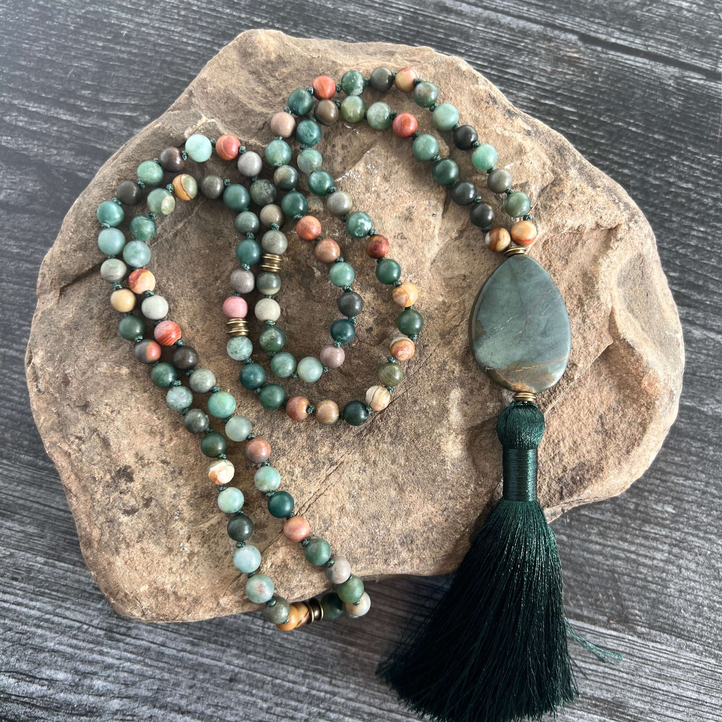 Forest Walk Mala This mala is made with high-quality Agate and Jasper gemstones which bring strength and tranquility to the wearer. Zodiac Signs: Leo, Gemini, Aries, Scorpio, and Virgo. Chakras: Third Eye, Root, Crown, and Heart. Handmade with authentic c