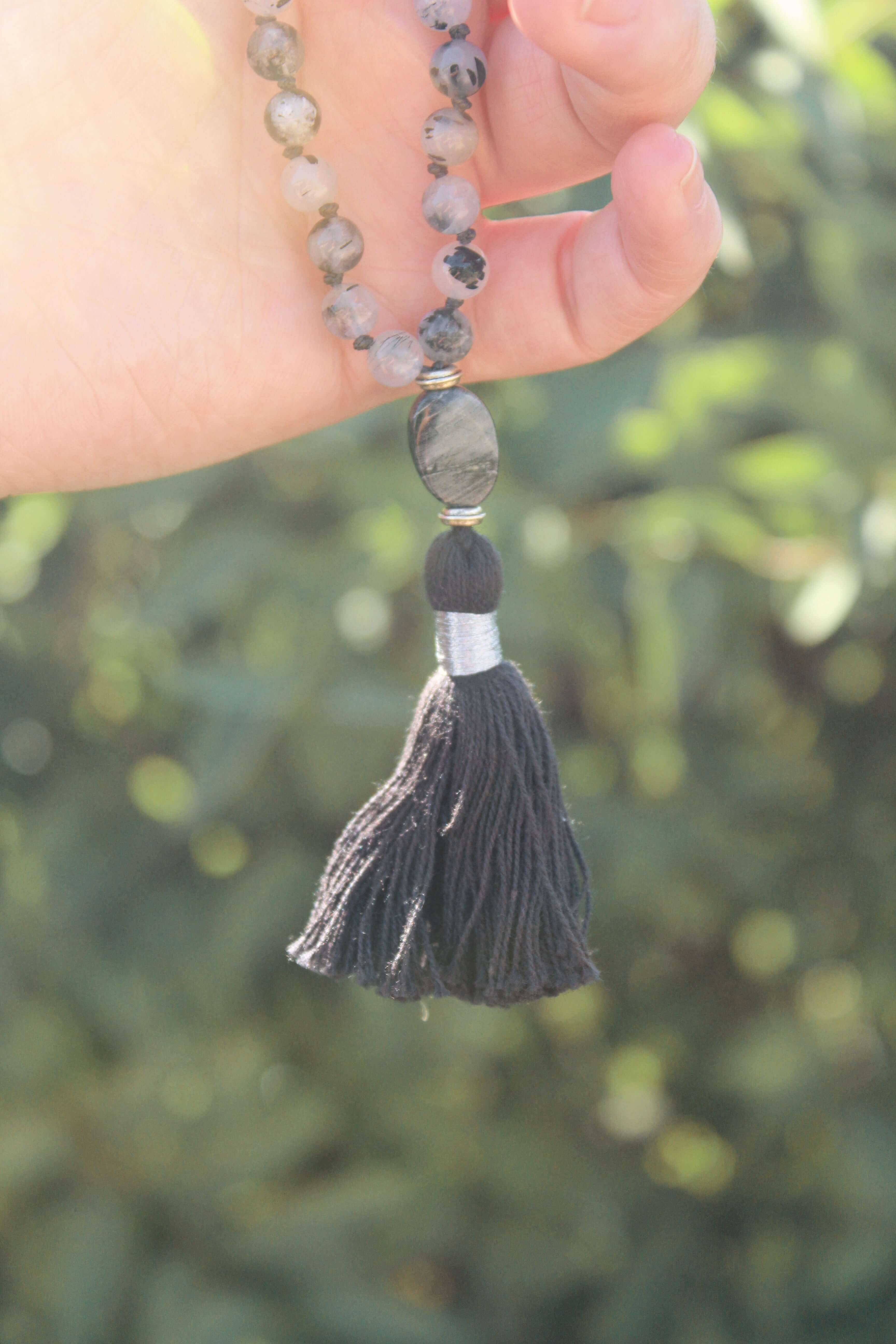 Tourmaline Quartz Wrist Mala These quarter malas are made with high-quality Tourmaline Quartz and Jasper gemstones which bring protection and tranquility to the wearer. Jasper is known as the “supreme nurturer.” Zodiac Signs: Libra, Scorpio, and Leo. Chak