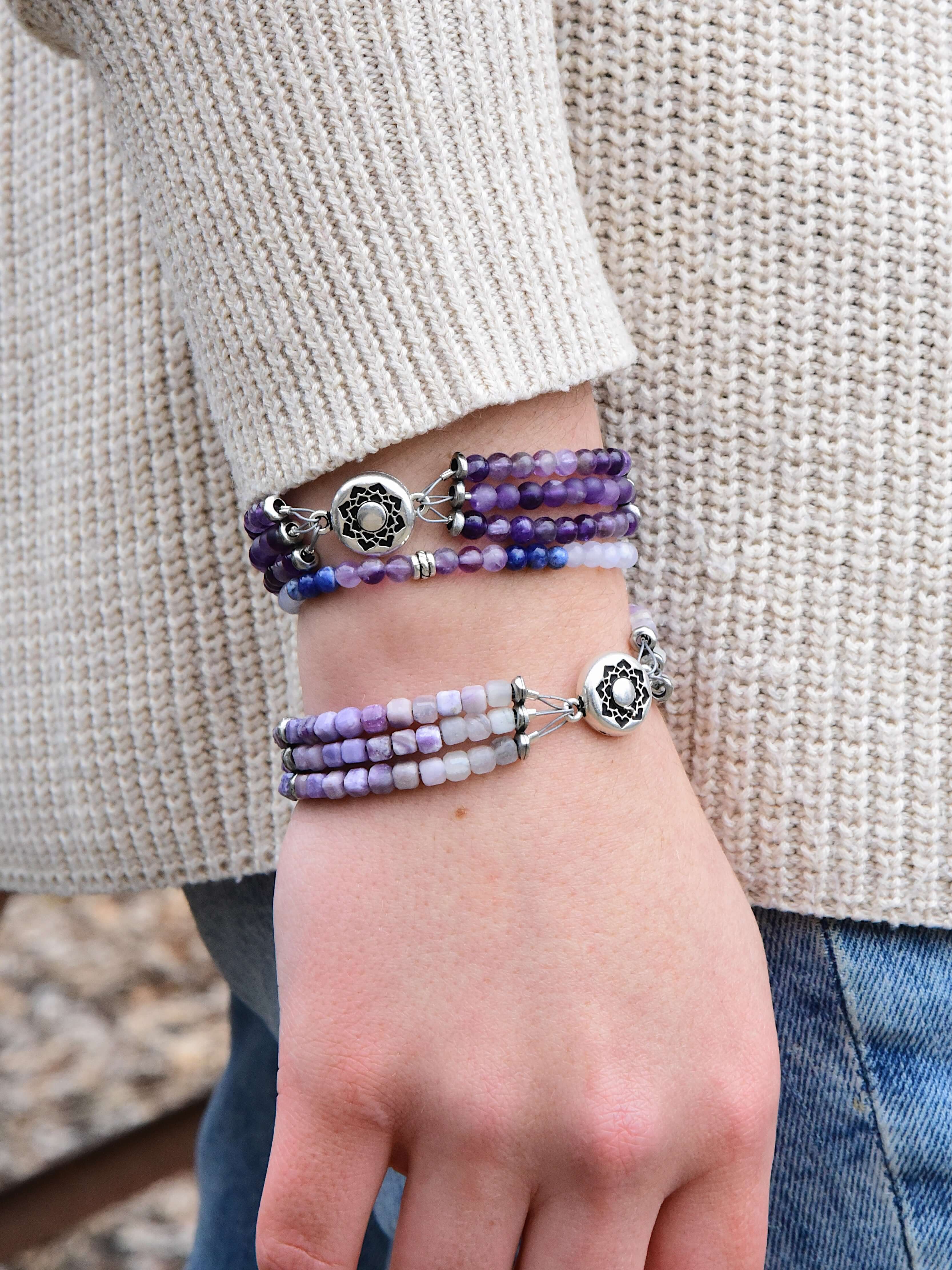 Silky Fluorite Stacked Bracelet Silky Fluorite is a rare form of Fluorite with a silky opaque luster. The luster appearance is from quartz inclusions. These quartz inclusions influence the passing of light through the mineral thus creating a silky, fibrou
