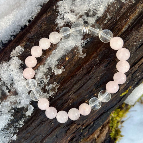 Love Amplified Bracelet The Love Amplified bracelet is made with Rose Quartz and Clear Quartz stone which bring the wearer a sense of amplified love and compassion, for themself and for others. Handmade with natural stones and crystals in Minnesota and Wi
