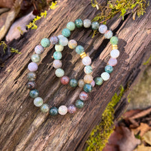 Load image into Gallery viewer, Agate Bracelet This bracelet is made from faceted Agate gemstones which bring comfort and hope to the wearer. A stone of strength, agate balances the yin and yang, the feminine and masculine energies within all of us. Due to the uniqueness of stone, your
