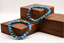 Load image into Gallery viewer, Apatite Bead Bracelet This bracelet is made with high-quality Apatite stones which bring clarity to the wearer. Zodiac Signs: Gemini and Libra. Chakra: Third Eye and Throat. Handmade with authentic crystals and gemstones in Minneapolis, MN.
