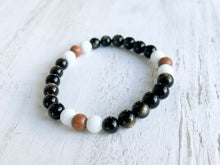 Load image into Gallery viewer, Golden Obsidian, Sandalwood, and White Jade Bracelet This bracelet is made with high quality Golden Obsidian, aromatic Sandalwood, and White Jade. Golden Obsidian and Sandalwood dissolves negativity, purifies the aura, and heals the solar plexus chakra wh
