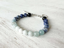Load image into Gallery viewer, Air Element Bracelet This bracelet is made with Black Obsidian, Sodalite, and Aquamarine to represent the air element. These stones bring the wearer heightened intuition, calmness, and mental clarity.
