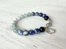 Load image into Gallery viewer, Air Element Bracelet This bracelet is made with Black Obsidian, Sodalite, and Aquamarine to represent the air element. These stones bring the wearer heightened intuition, calmness, and mental clarity.
