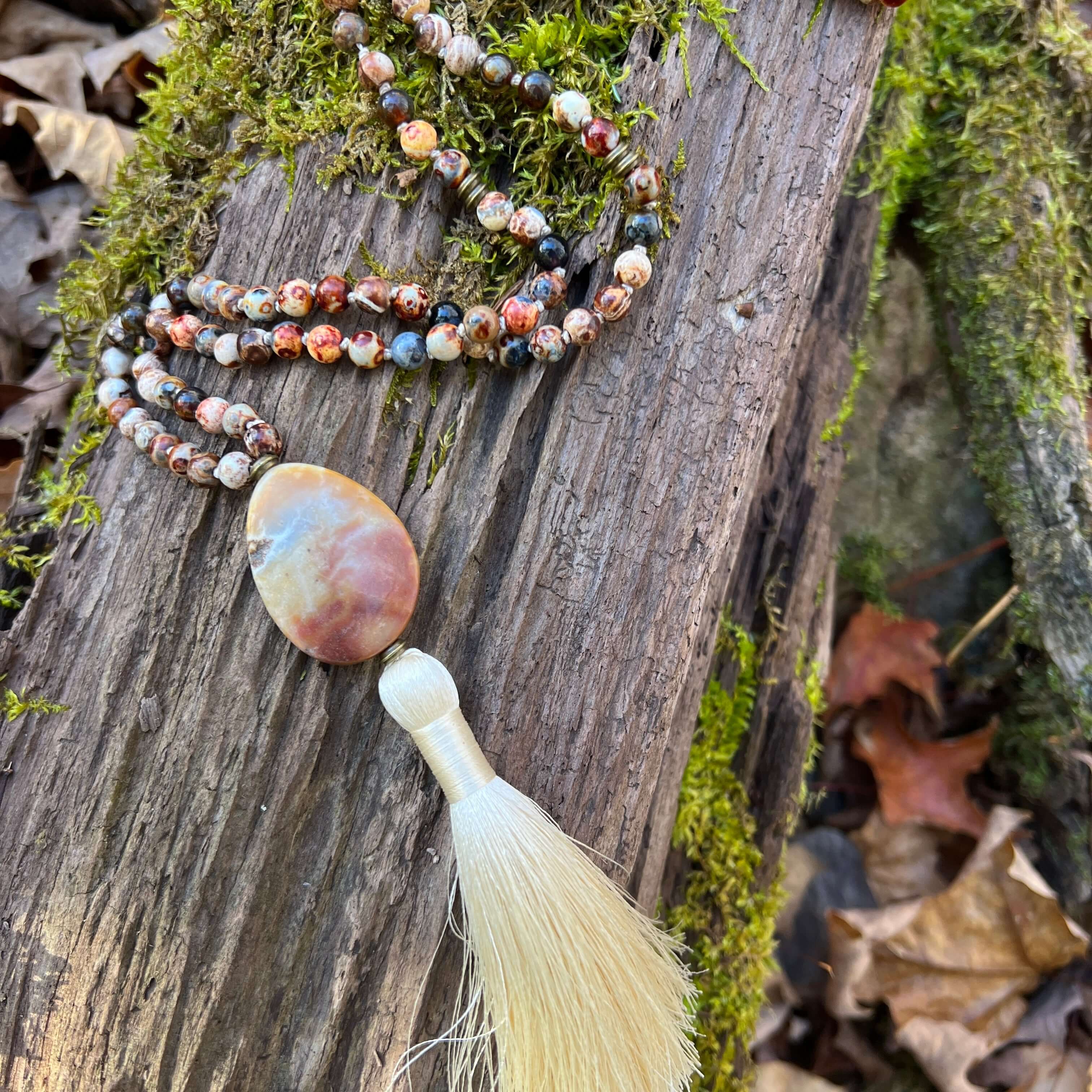 Ancient Cellar Black Agate Mala This mala is made with high-quality Ancient Cellar Agate & Amazonite stones which provide grounding, calmness and strength to its wearer.