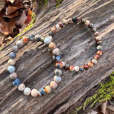 Ancient Cellar Agate Bracelets These bracelets are made with high-quality Ancient Cellar Agate beads which bring stability and clarity to the wearer. Zodiac: Gemini & Virgo Chakras: Third Eye, Root, Crown & Heart. Handmade with authentic crystals and gems
