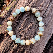 Load image into Gallery viewer, Lemurian Aquatine Calcite Bracelet Lemurian Aquatine Calcite is also known as Blue Argentinian Calcite, Argentinian Blue Onyx and Argentinian Aquamarine Onyx, as the main source of this stone comes from (as you can probably guess) Argentina. Lemurian Aqua
