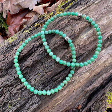 African Jade Mini Bead Bracelet This bracelet is made with high-quality African Jade gemstones which brings creativity, wisdom, and healing to the wearer. Zodiac: Pisces Chakras: Heart. Handmade with authentic crystals and gemstones.