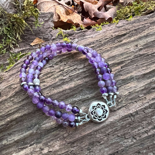 Amethyst Stacked Bead Bracelet This bracelet is made with high-quality Amethyst stones which bring serenity to the wearer. Zodiac: Aquarius. Chakras: Third Eye and Crown. Birthstone: February. Handmade with authentic crystals and gemstones in Minneapolis,