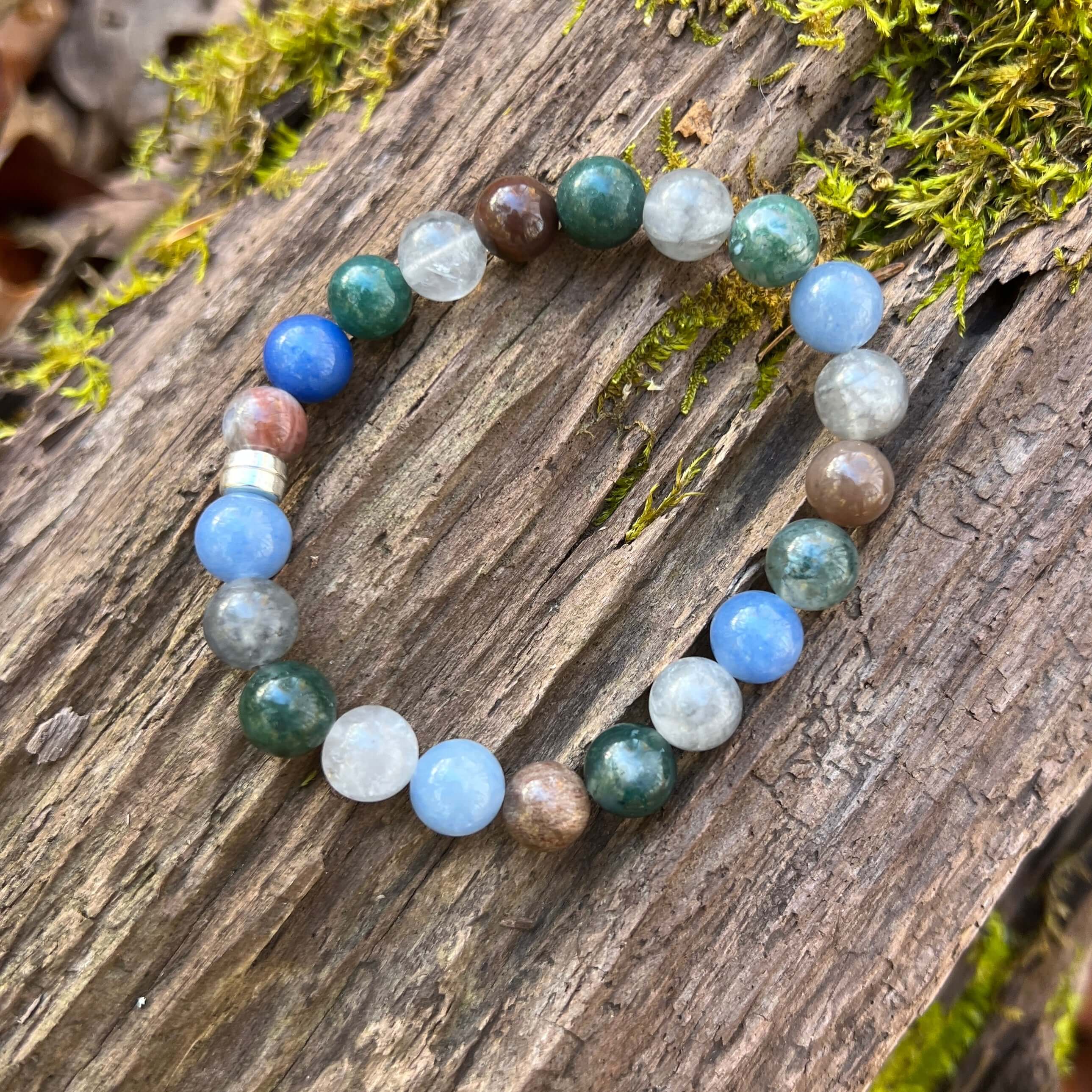 Dappled Sunlight Bracelet This bracelet is made with high-quality Moss Agate, Green Aventurine, Aquamarine, Cloud Quartz & Wood Opal stones which bring abundance and calm to the wearer. Zodiac: Virgo, Taurus, Pisces, Aries, Aquarius & Leo Chakras: Heart,
