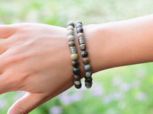 Load image into Gallery viewer, Gray Thunder Jasper Bracelet This bracelet is made with authentic Gray Thunder Jasper gemstones which provide support and nurturing energy. Zodiac Signs: Aries &amp; Scorpio. Chakras: Root &amp; Solar Plexus. Handmade with authentic crystals and gemstones in Minn
