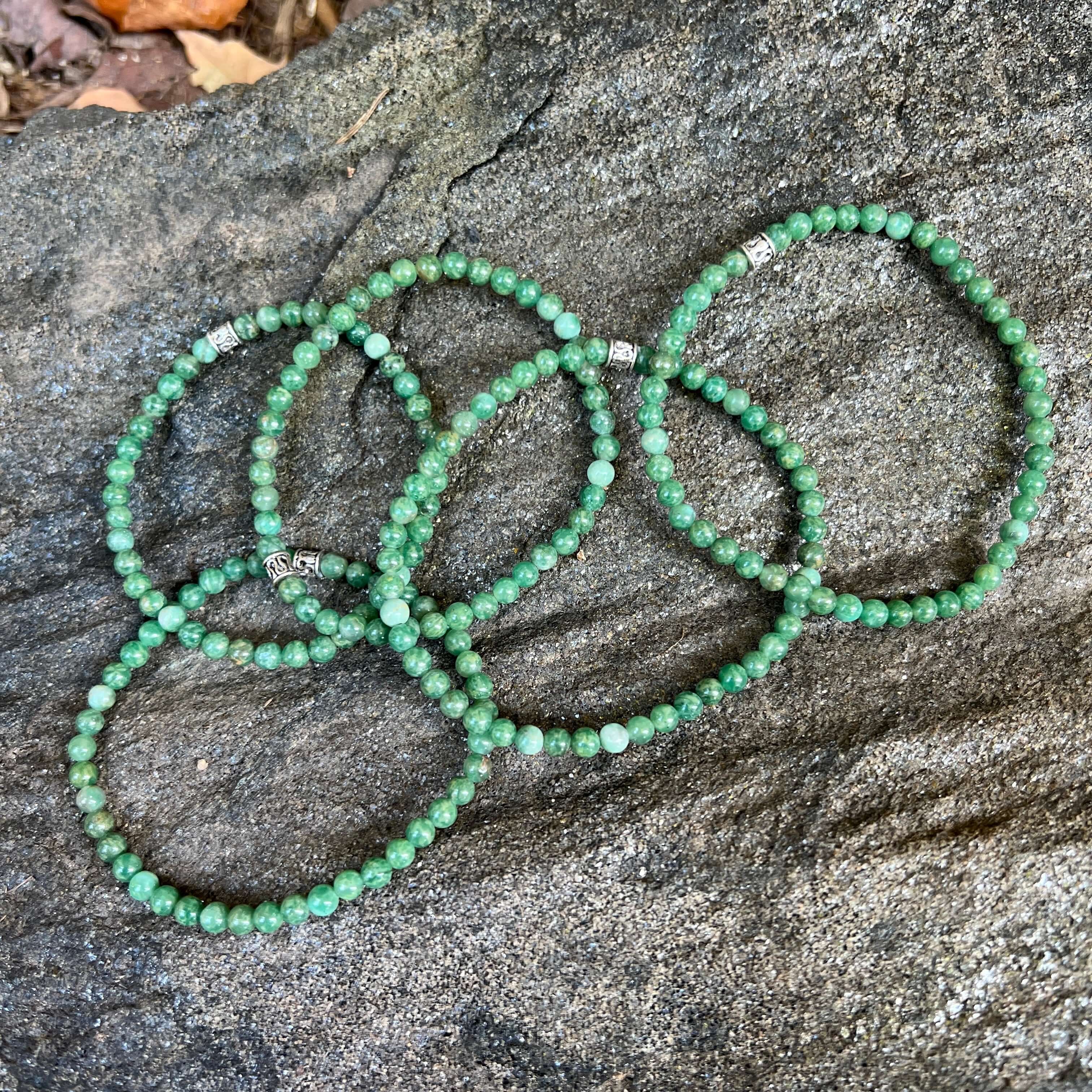African Jade Mini Bead Bracelet This bracelet is made with high-quality African Jade gemstones which brings creativity, wisdom, and healing to the wearer. Zodiac: Pisces Chakras: Heart. Handmade with authentic crystals and gemstones.