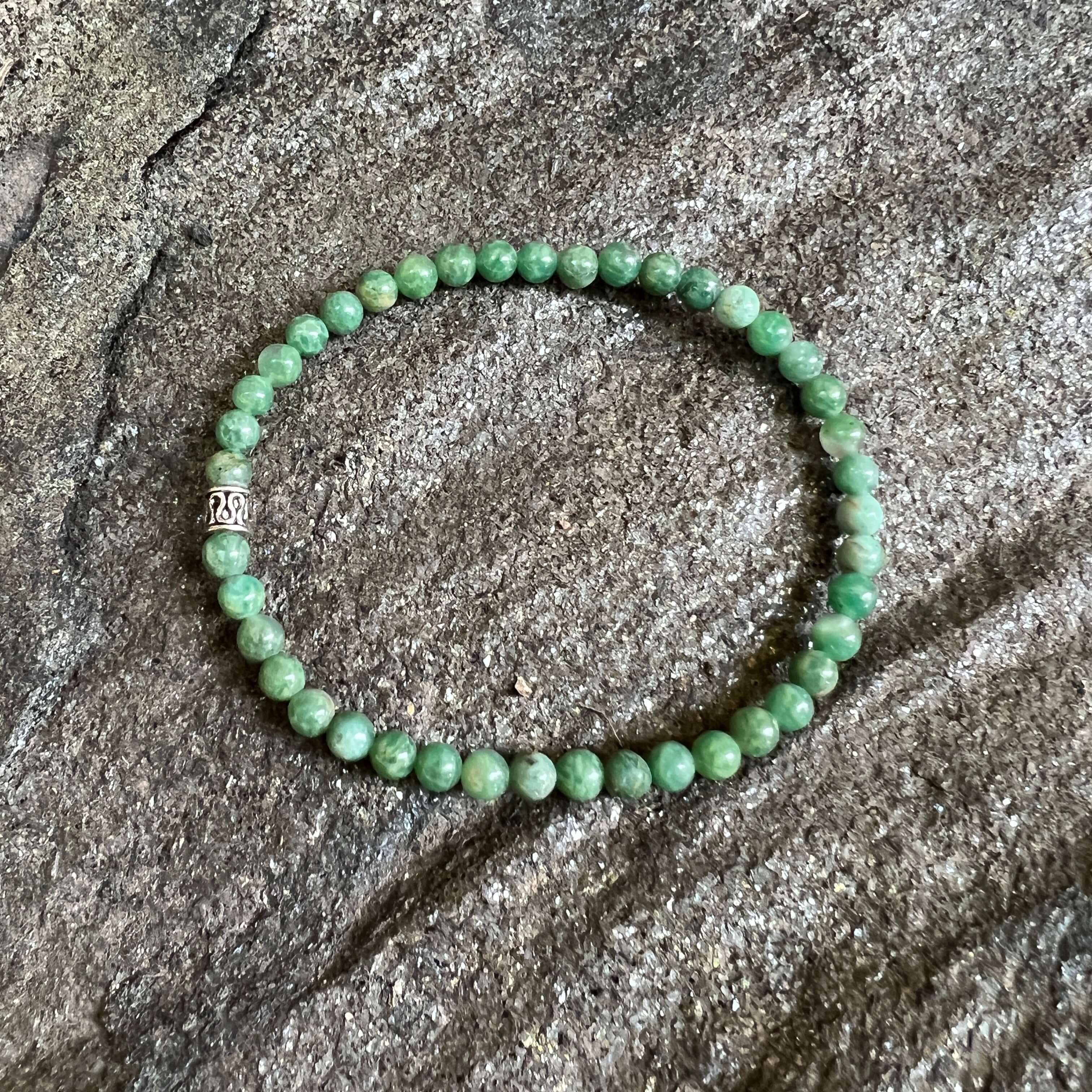 African Jade Mini Bead Bracelet This bracelet is made with high-quality African Jade gemstones which brings creativity, wisdom, and healing to the wearer. Zodiac: Pisces Chakras: Heart. Handmade with authentic crystals and gemstones.