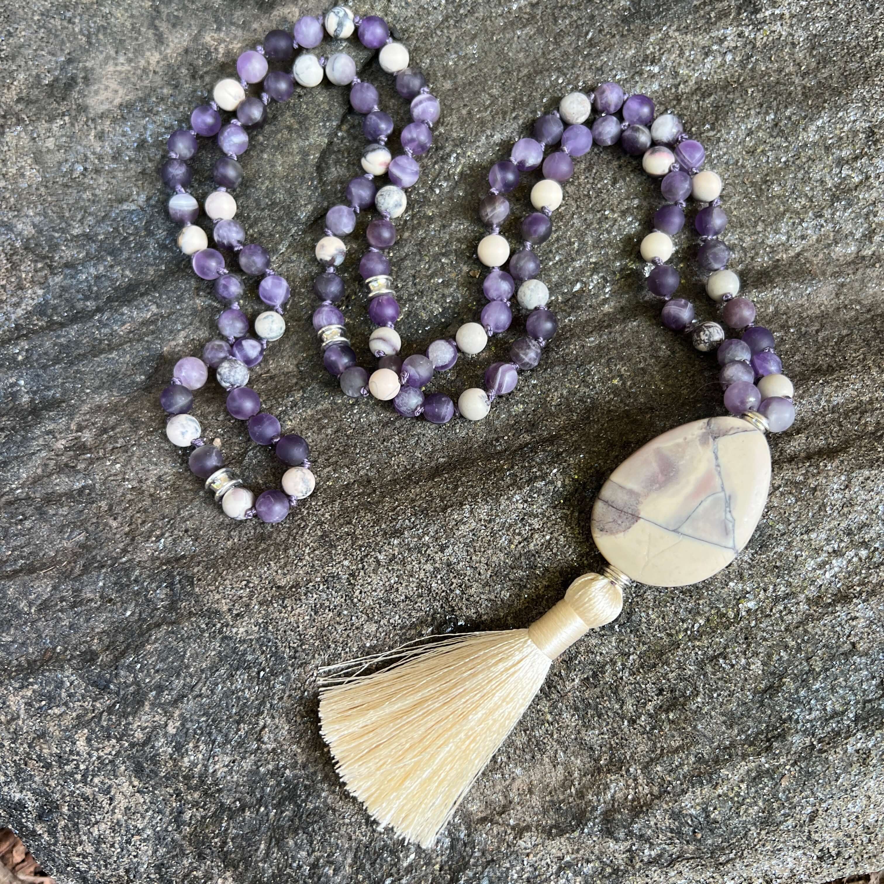 Third Eye Chakra Mala The Third Eye Chakra Mala is designed to help you tune into your inner voice and intuition. Handmade with multiple forms of matte Amethyst and Porcelain Jasper stones, the Third Eye Chakra Mala provides the wearer with energy that al