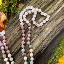 Load image into Gallery viewer, Loving Growth Mala Introducing our exquisite Loving Growth Mala Necklace crafted with high-quality Rose Quartz, Lepidolite, Pink Zebra Jasper, and Dendritic Opal. This beautifully designed mala is not just a piece of jewelry; it&#39;s a spiritual companion th
