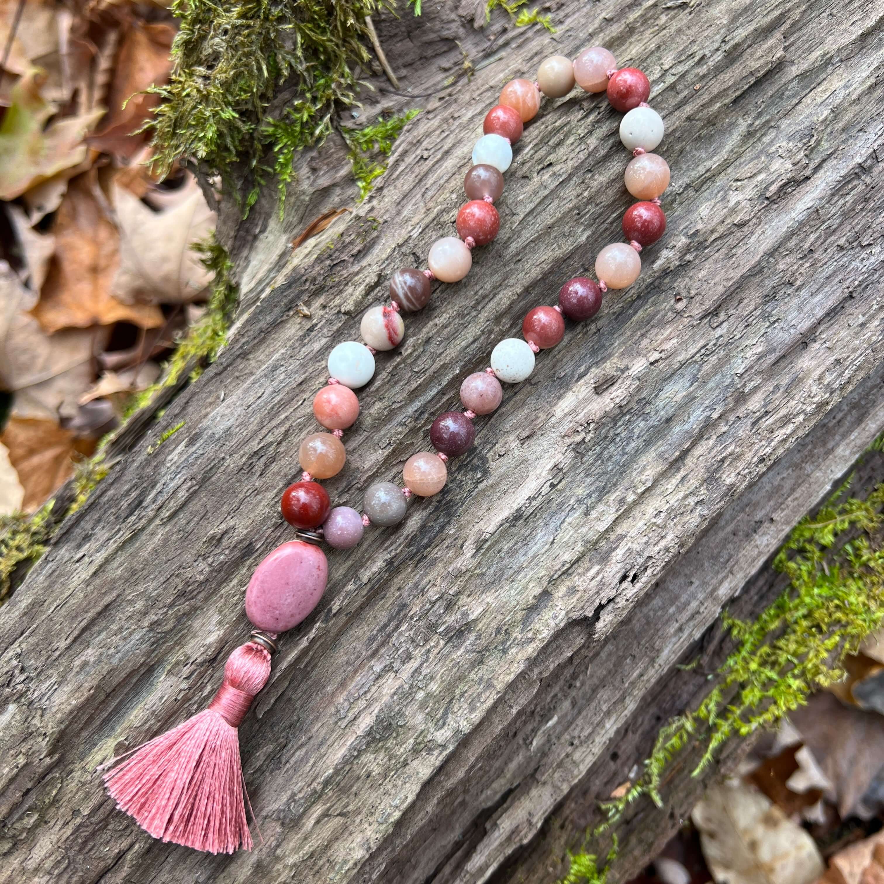 Moonstone and Mookaite Mala Bracelet Elevate your spirit with a handcrafted Moonstone and Mookaite Mala Bracelet, a harmonious blend of these two powerful gemstones which will bring the user a sense of inner growth and enhanced intuition.