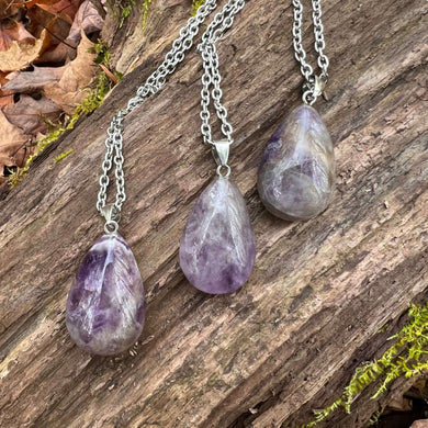 Amethyst Teardrop Necklace This necklace is made with high-quality Amethyst which brings calm and balance to the wearer. Zodiac: Pisces & Aquarius Chakras: Third Eye, Crown, All. Handmade with authentic crystals and gemstones in Minneapolis, MN.