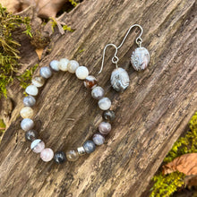 Load image into Gallery viewer, Botswana Agate Bracelet This bracelet is made from authentic Botswana Agate gemstones which bring comfort and hope to the wearer. Zodiac Signs: Gemini. Chakras: Root. Handmade with authentic crystals and gemstones in Minneapolis, MN.
